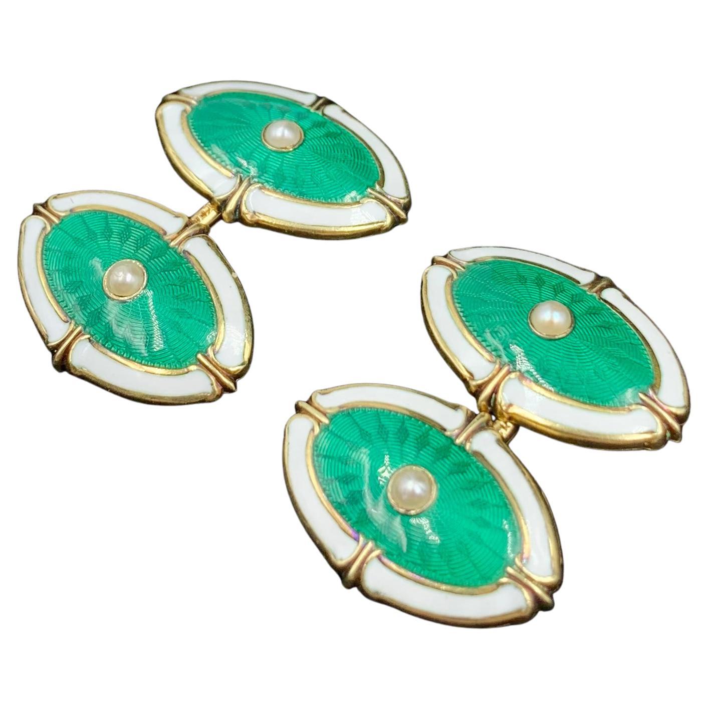 Eye of Protection jewels have been a classic amulet for centuries, designed to attract positive energy.
This pair of green guilloche enamel cufflinks dates from the Edwardian Period, early twentieth century. Lovely details such as the guilloche