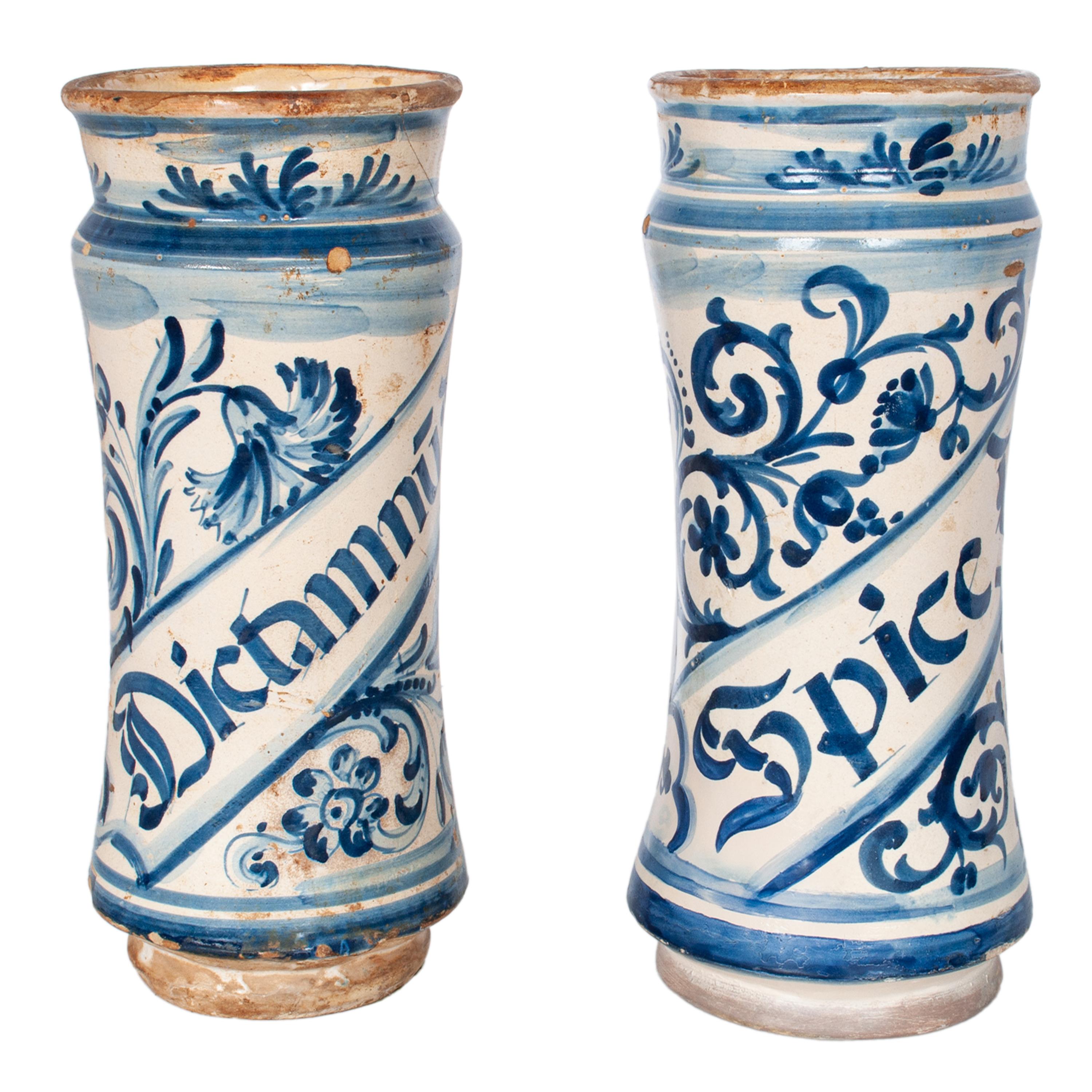 A very good pair of antique 17th century Spanish blue & white pottery albarelli or apothecary jars, circa 1680.
From the 15th century onward cylindrical drug jars like this were used throughout Europe & Islamic countries in North Africa & the Near