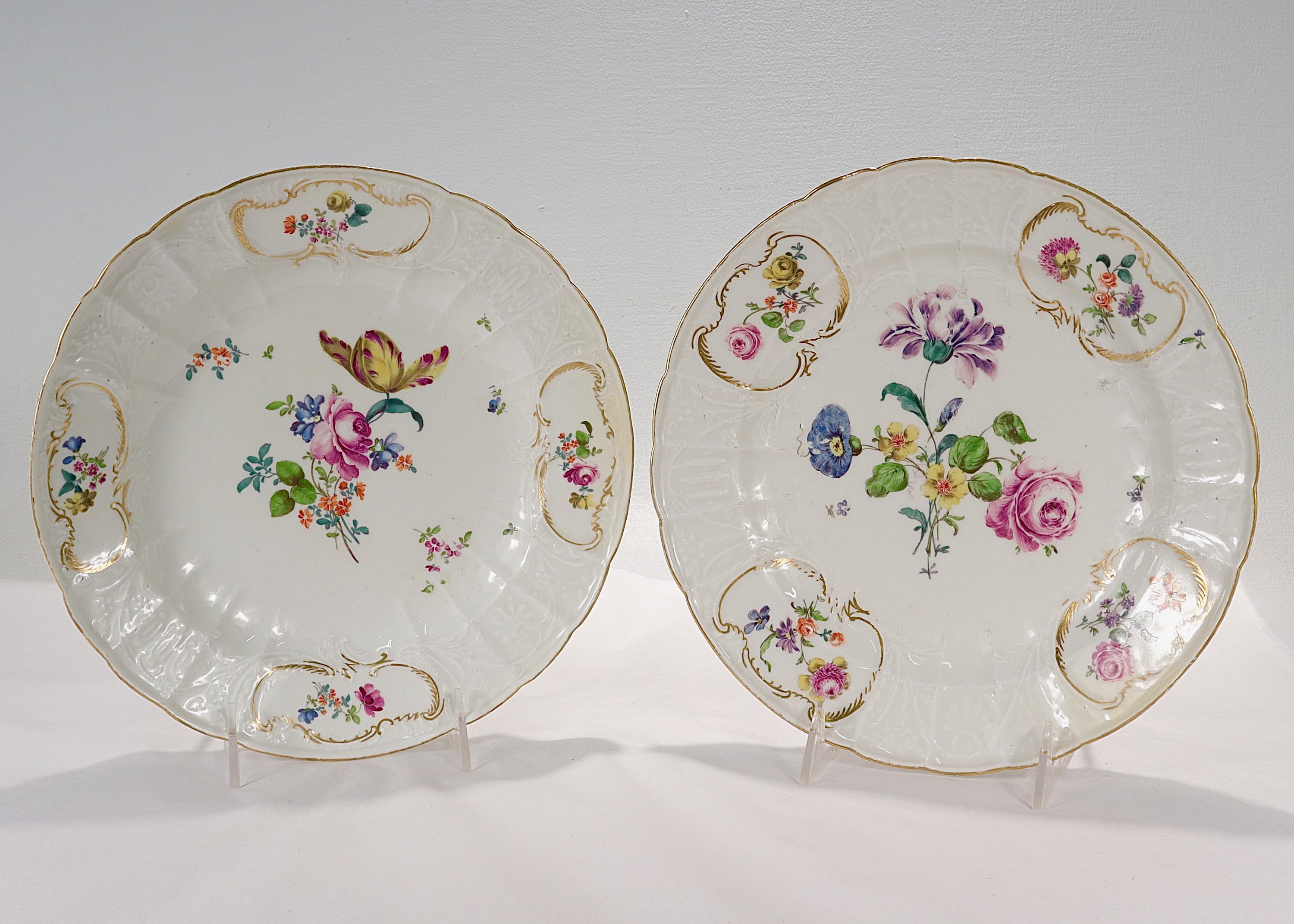 A fine pair of antique Meissen Dulong Variant plates.

By the Royal Meissen Porcelain Manufactory.

Decorated with Deutsche Blumen floral sprays to the center and sides including roses, tulips, morning glories, and other various flowers. 

The