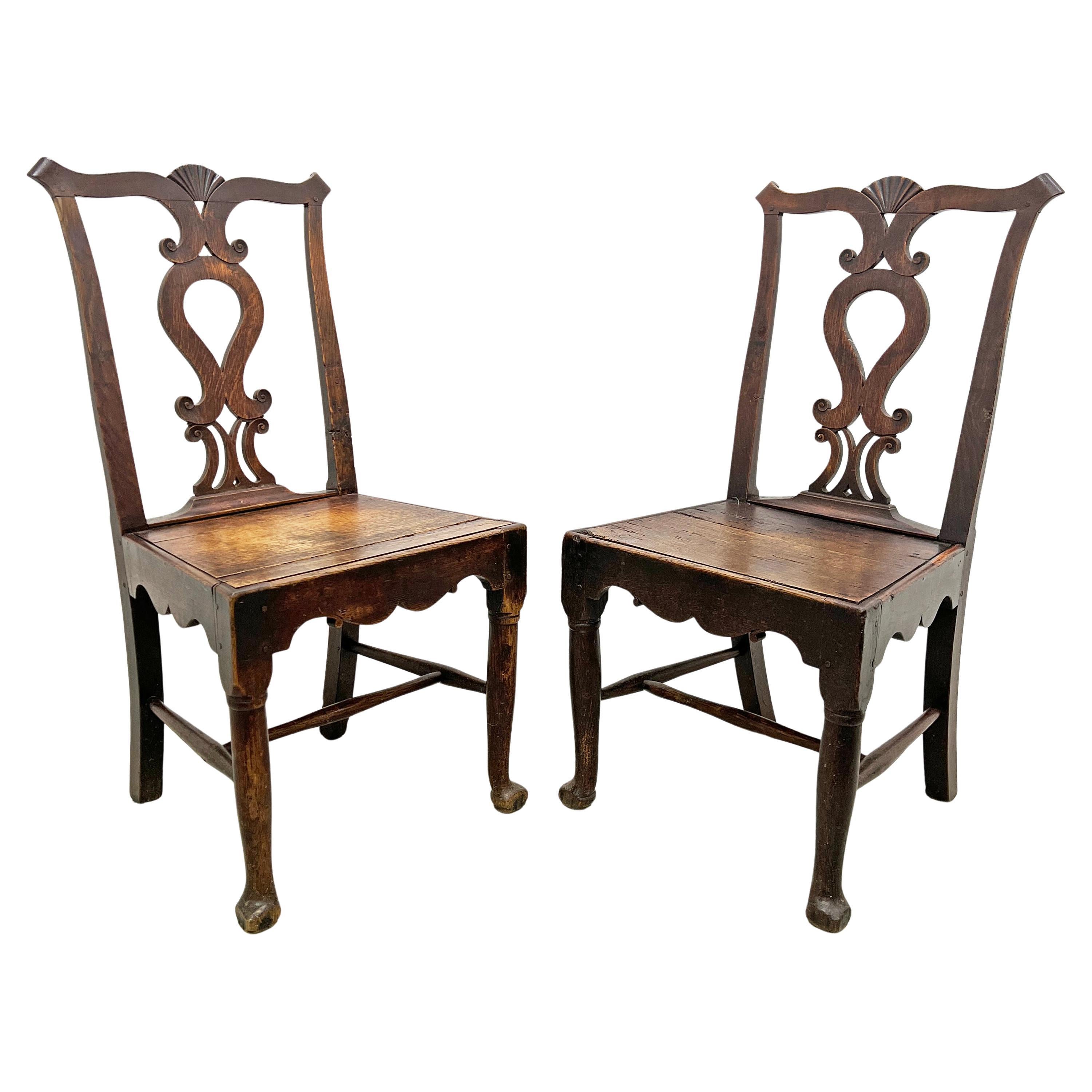 Pair Antique 18th Century Irish Oak Chippendale Side Chairs with Celtic Carving For Sale