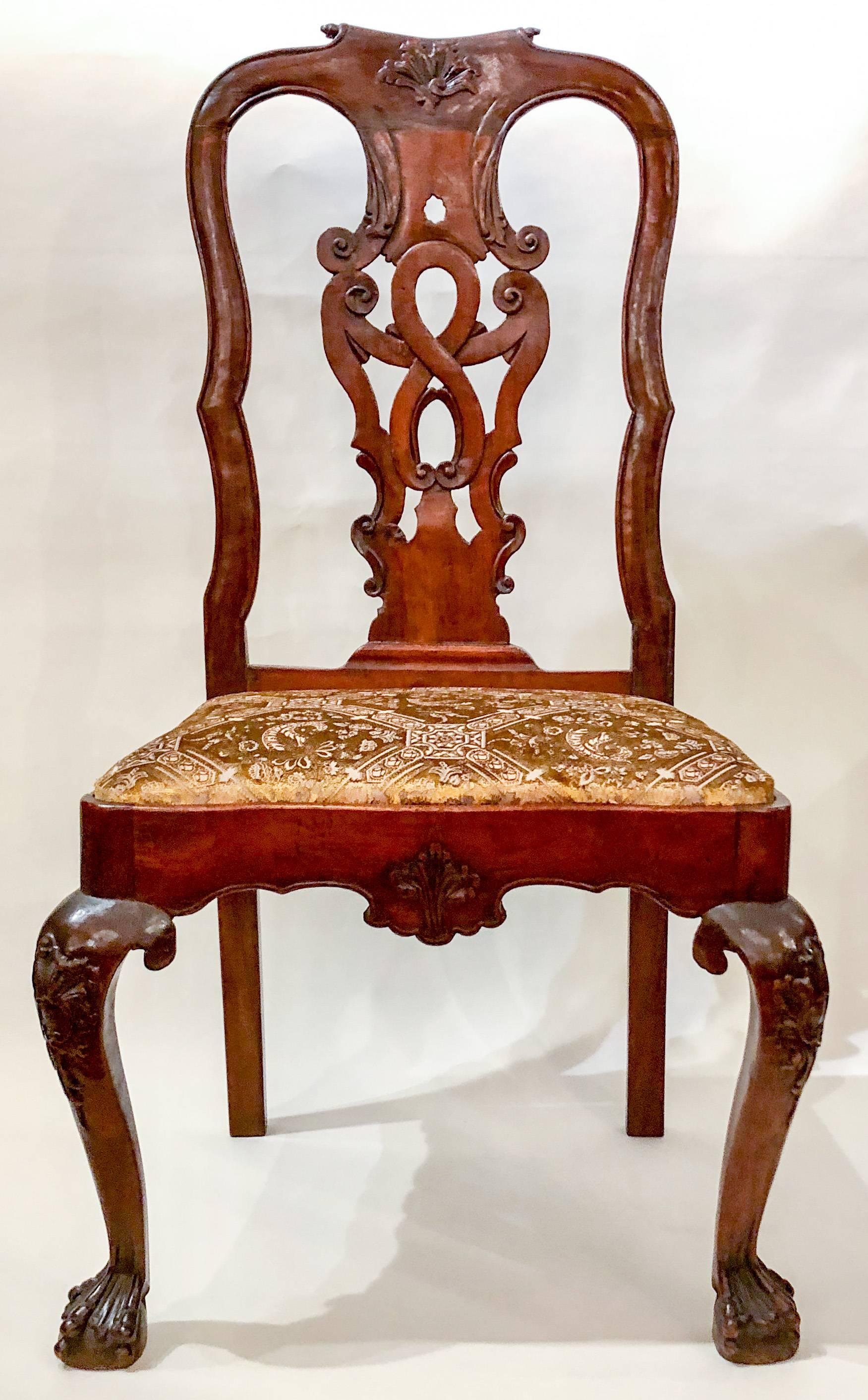 Pair of antique 18th century Queen Anne mahogany side chairs that are sure to please and are nicely upholstered.
 