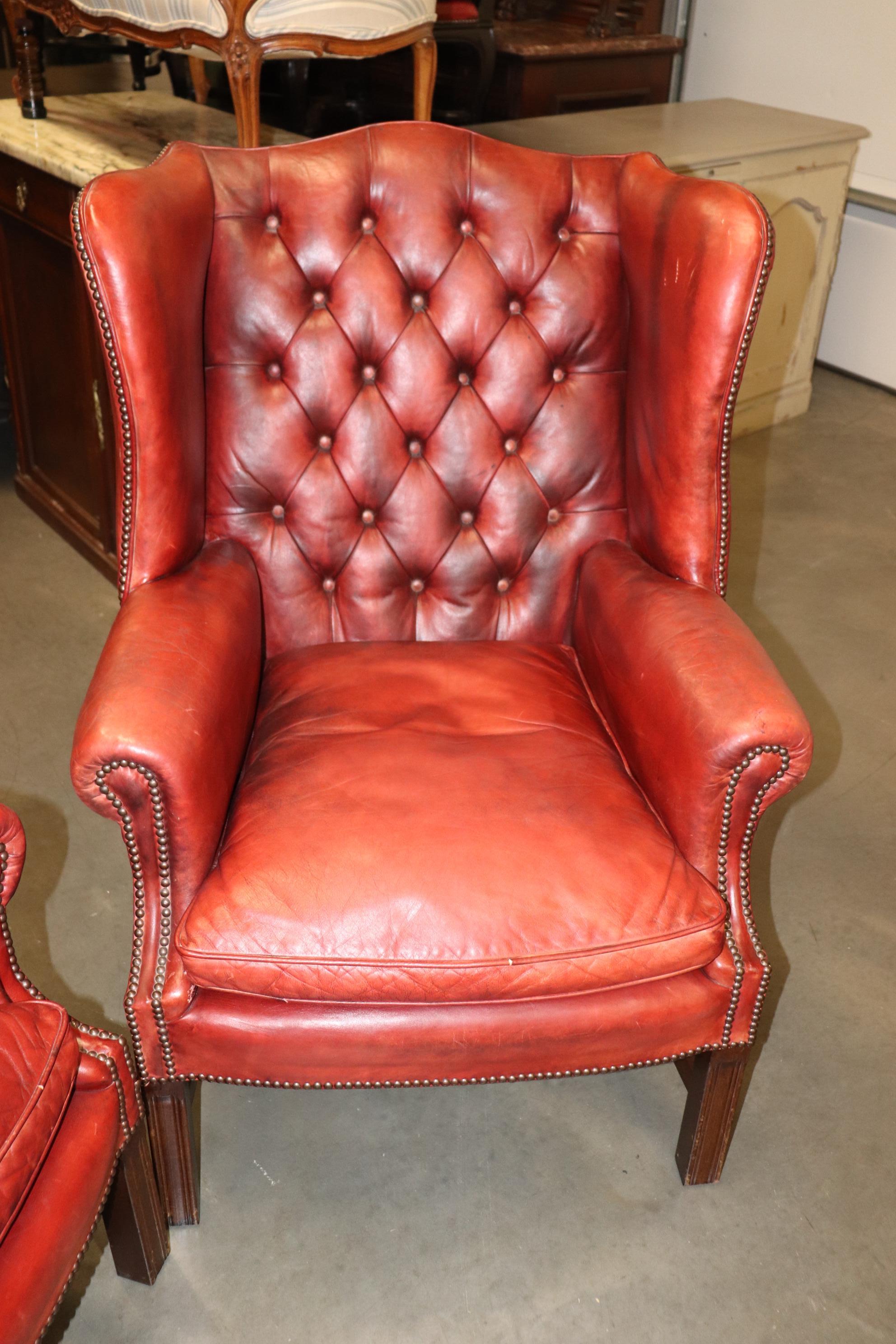 Early 20th Century Pair Antique 1920s Era Red Leather Chertfield Tufted Georgian Wingback Chairs