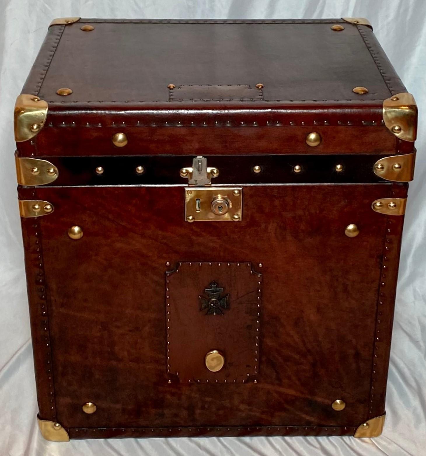 Pair antique 19th century British brass mounted leather military trunks.
