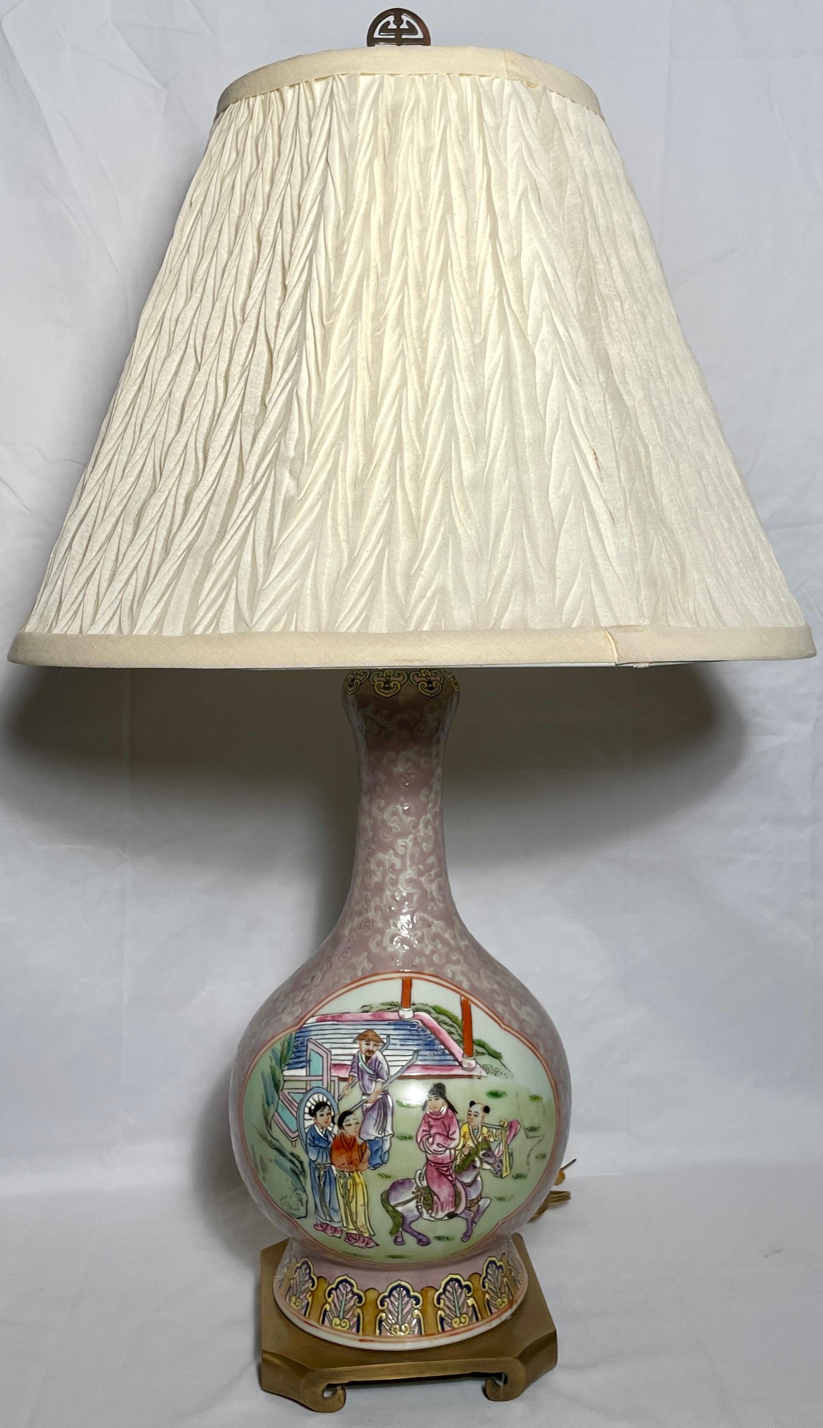 Pair antique 19th century Chinese porcelain bottle vase lamps with Mandarin panels. 
