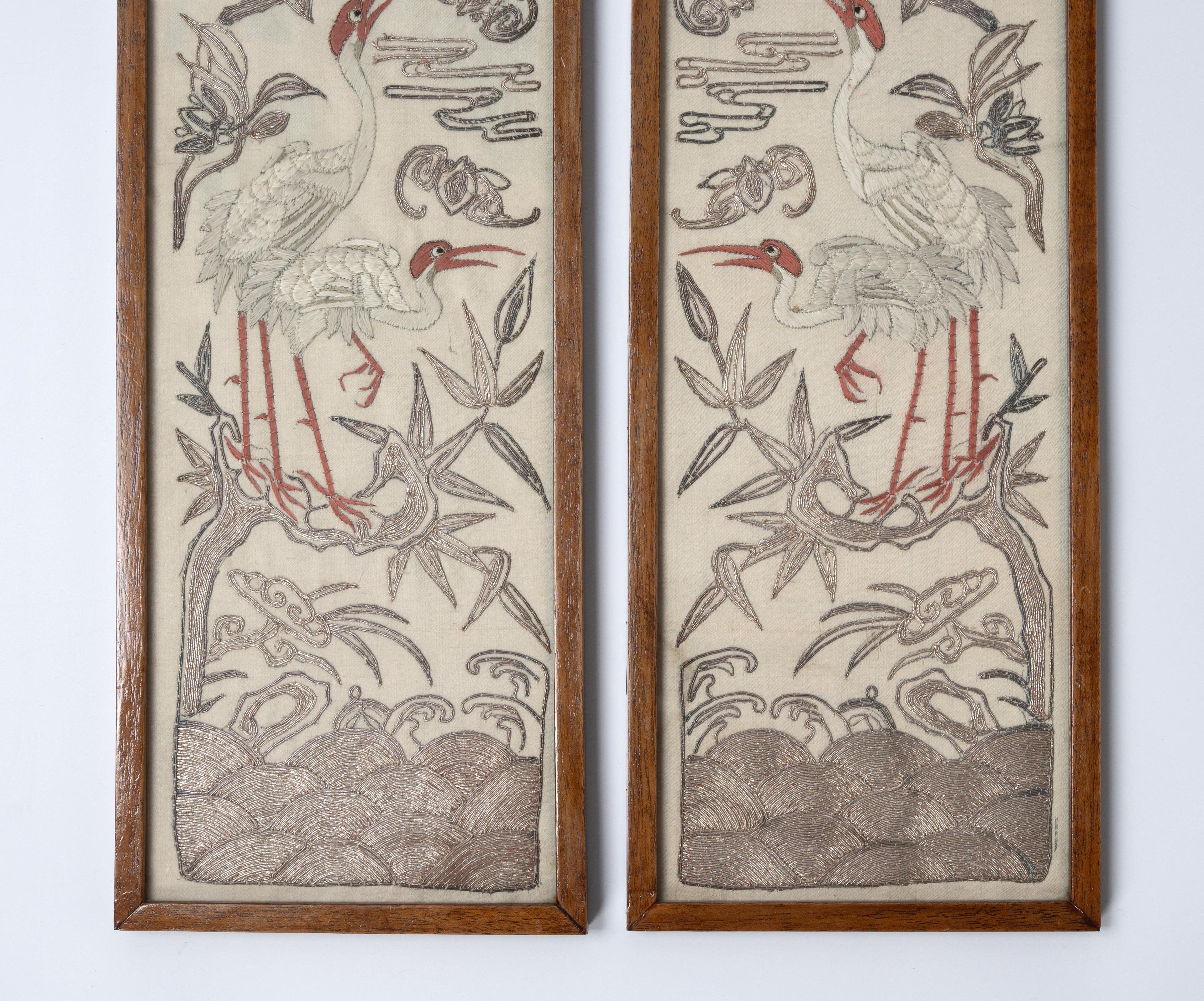 A PAIR OF CHINESE SILK EMBROIDERED PANELS 19th Century, Qing Dynasty
Each worked to depict a pair of cranes perched atop a leafy branch over crashing waves, mounted in glazed frames, 40.5 x 14cm (2)
Very good condition commensurate of age.