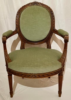 Paar Antique 19th Century French Carved Walnut Arm-Chairs.