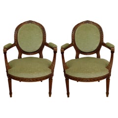 Paar Antique 19th Century French Carved Walnut Arm-Chairs.
