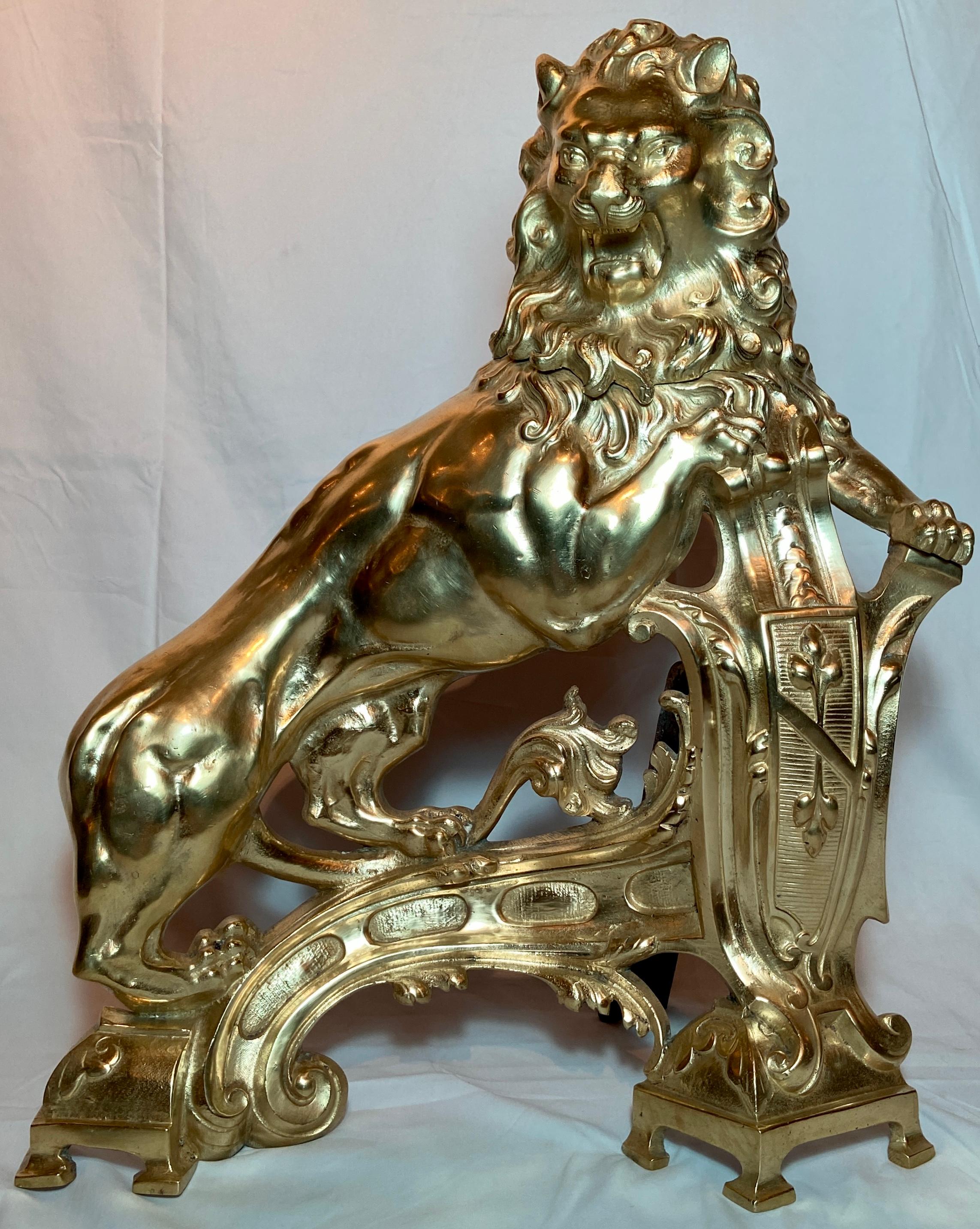 Pair antique 19th century French gold bronze figural lion andirons.