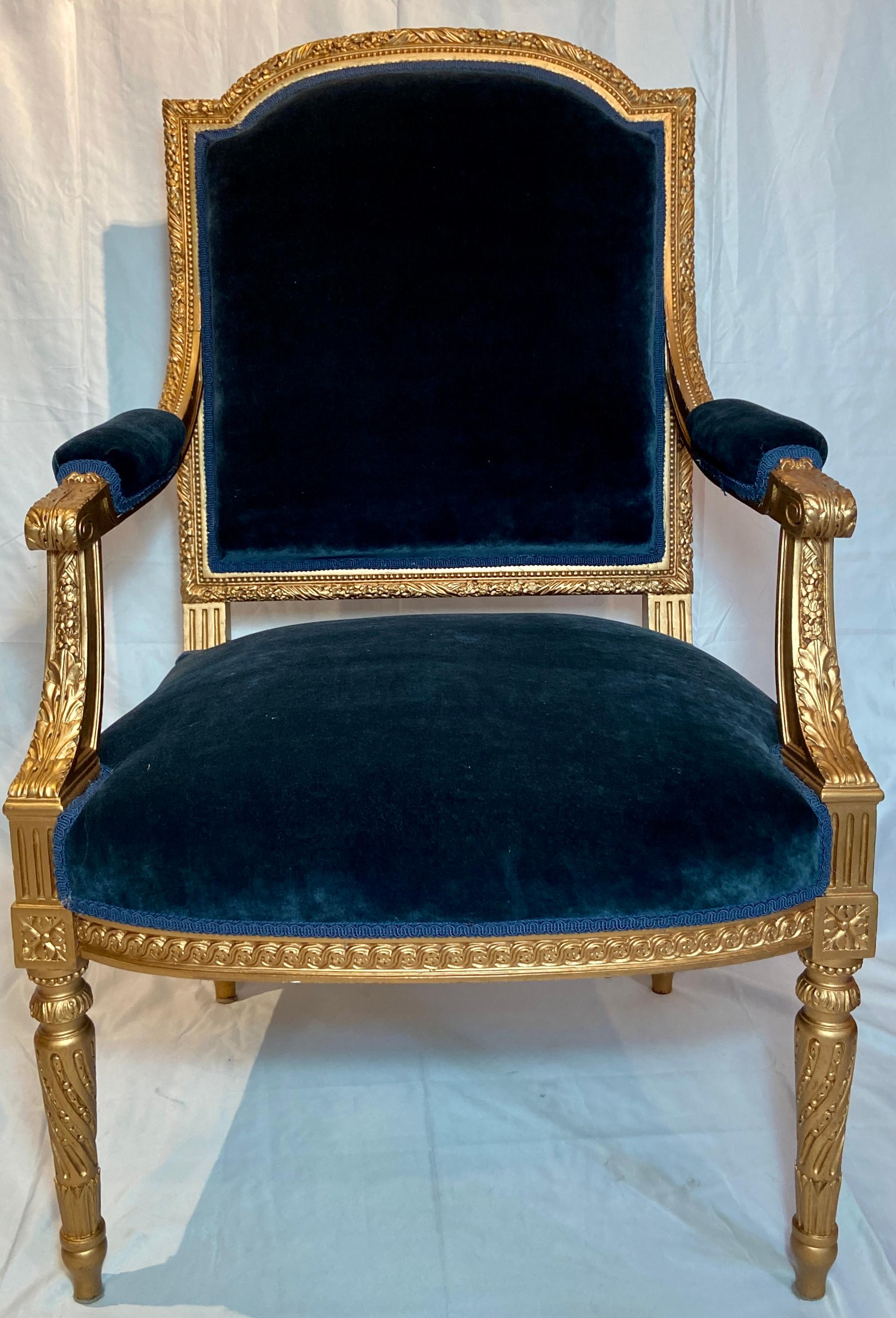 These beautiful arm chairs were recently reupholstered in a nice shade of royal navy blue. They have pleasing, traditional Louis XVI lines.
