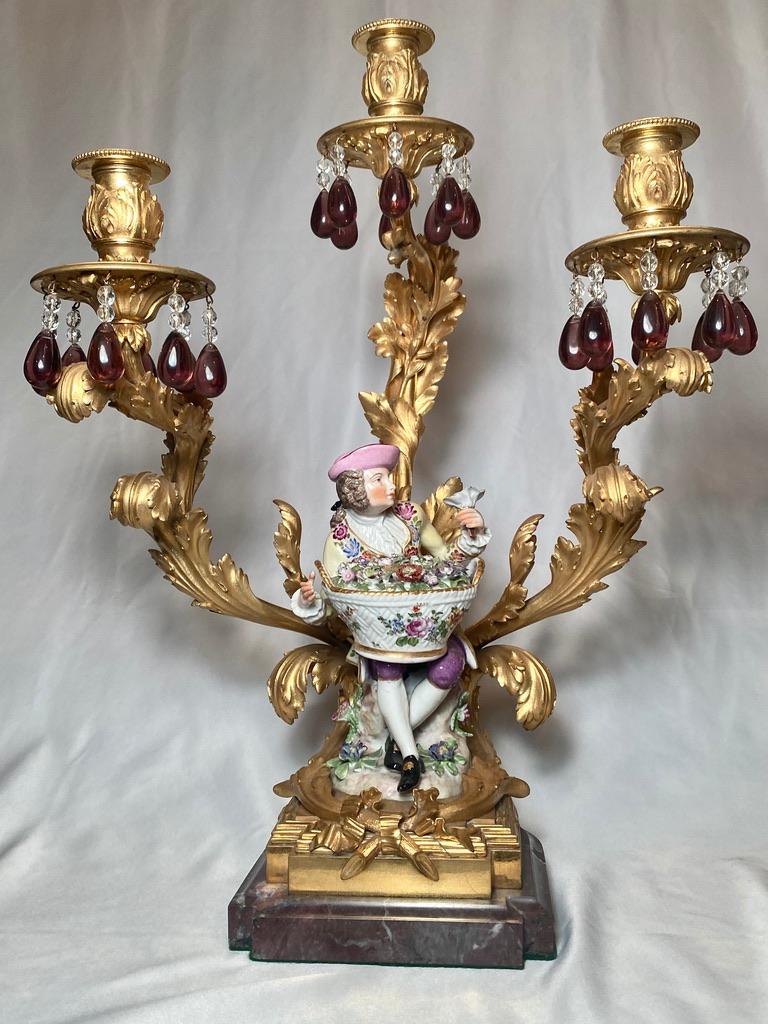 Pair of antique 19th century gold bronze and porcelain candelabra.