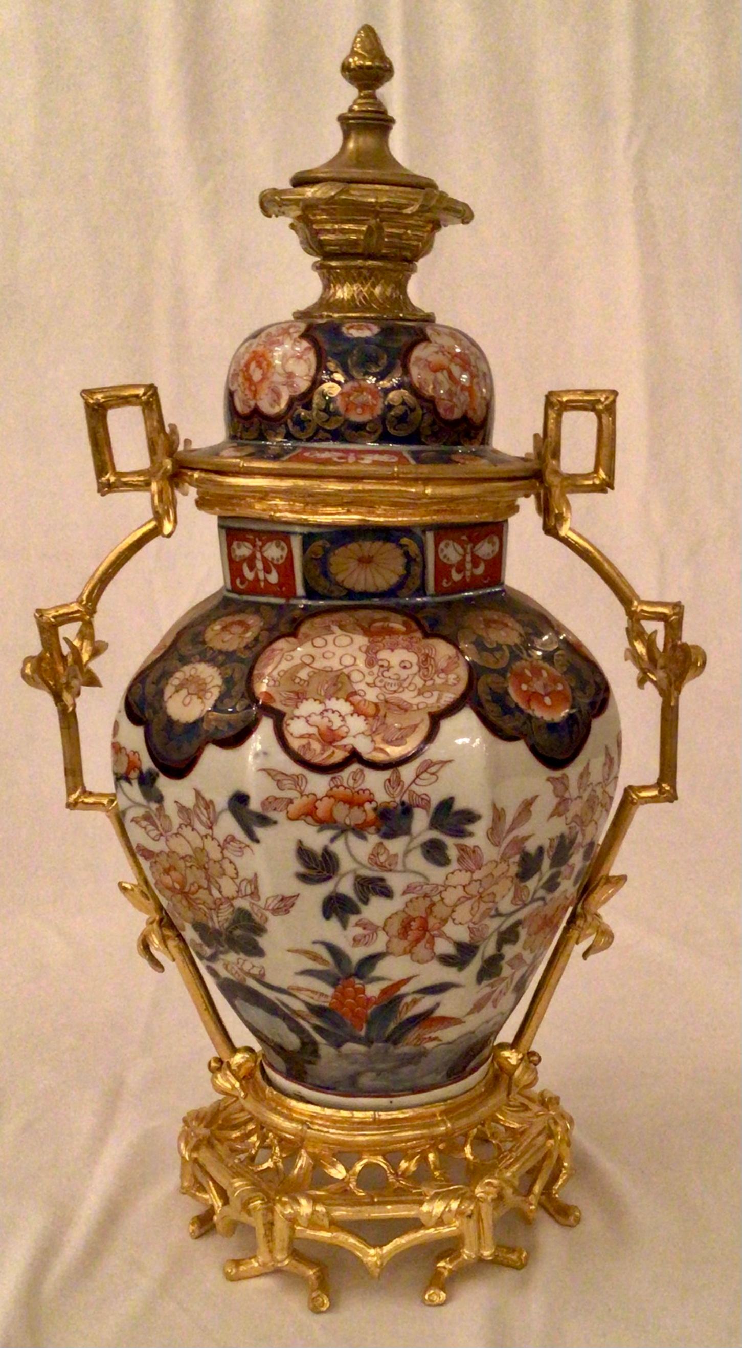 Pair of antique museum quality 19th century Imari porcelain urns with ormolu mounts, circa 1840-1860.
URN201.