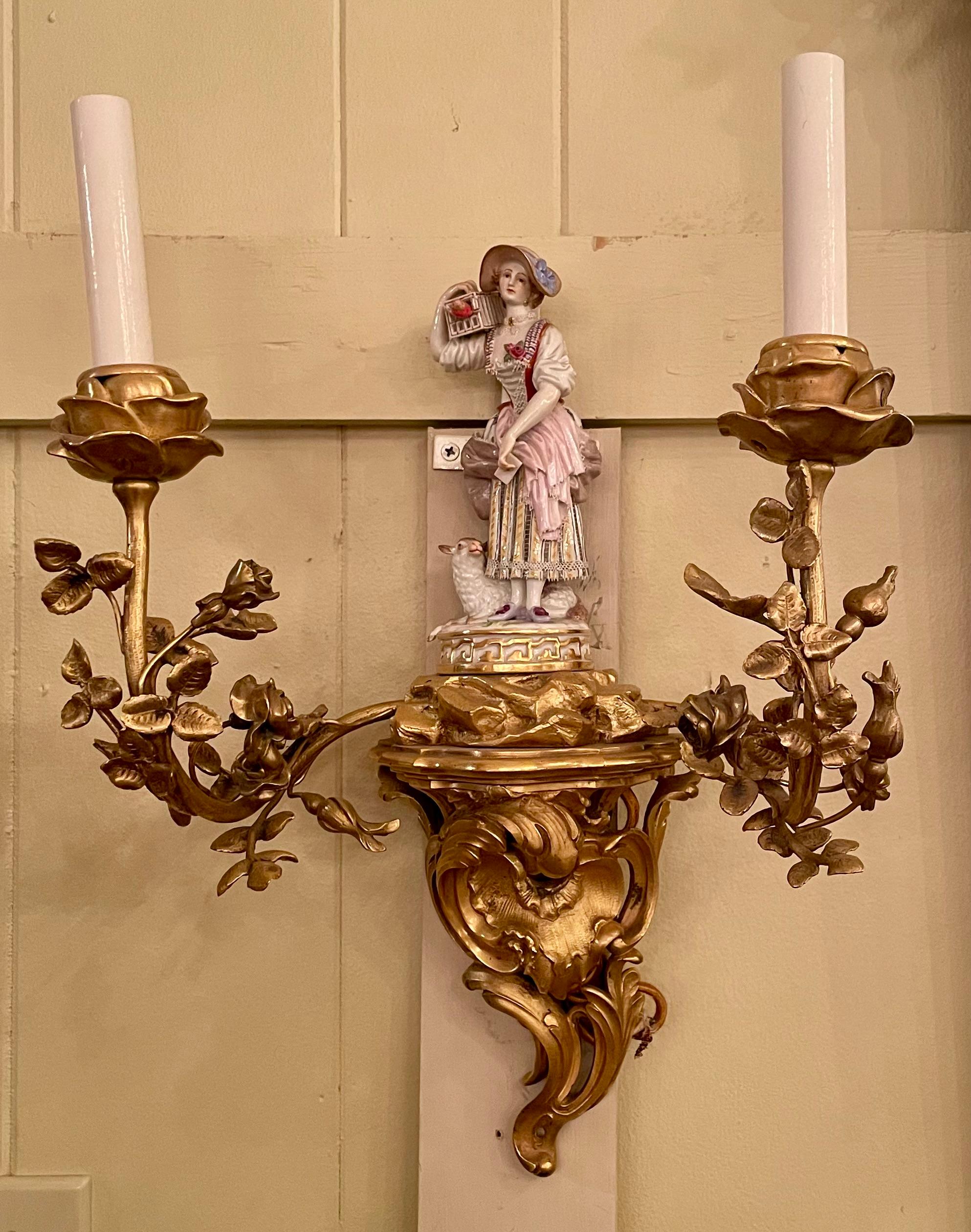 Pair antique early 19th century ormolu sconces with rare Meissen porcelain figurines.