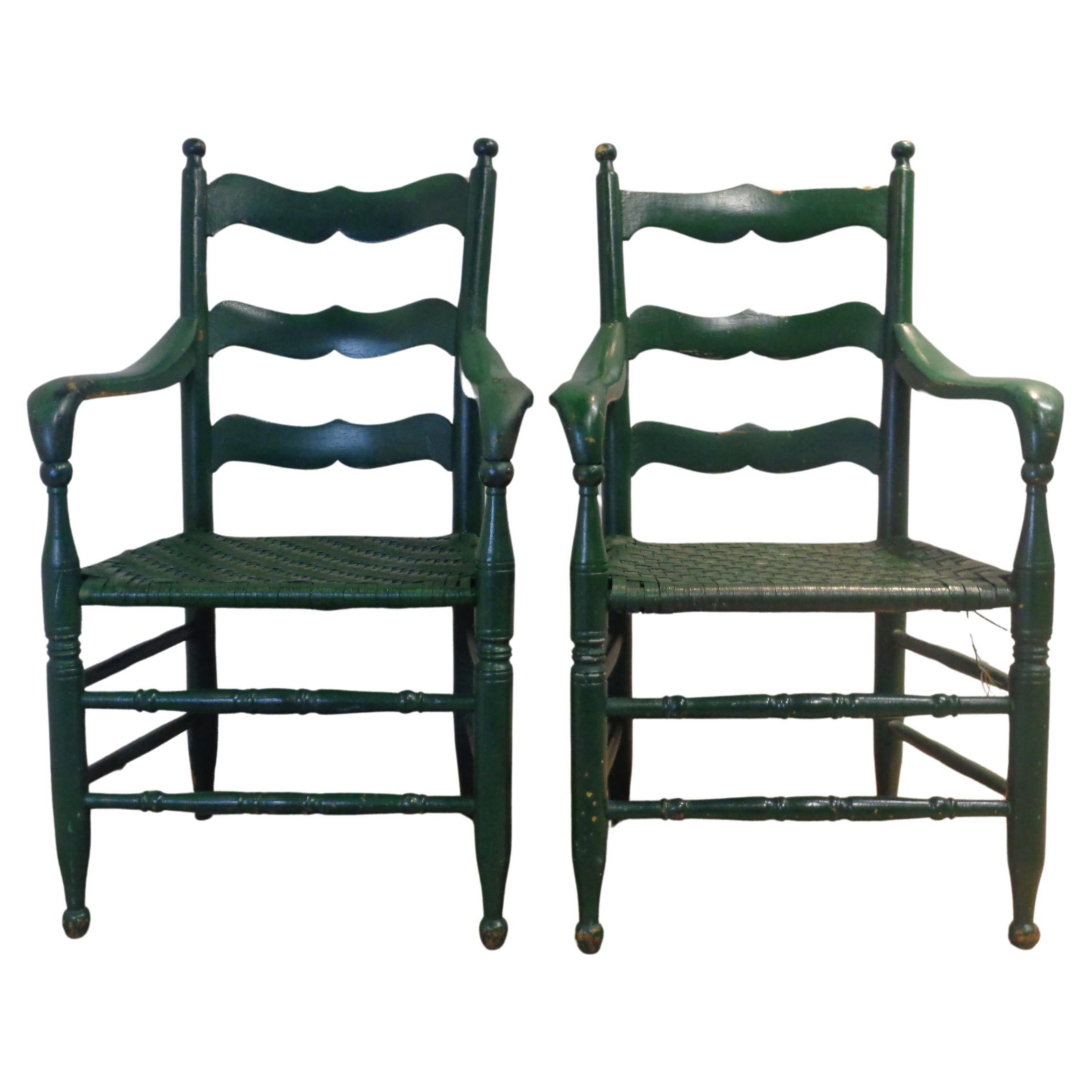 Pair of antique American country  armchairs w/ beautifully shaped wide arms / woven splint reed seats and nicely aged old dark green painted surface. $PRICE IS FOR THE PAIR$ Look at all pictures and read condition report in comment section **** HAND