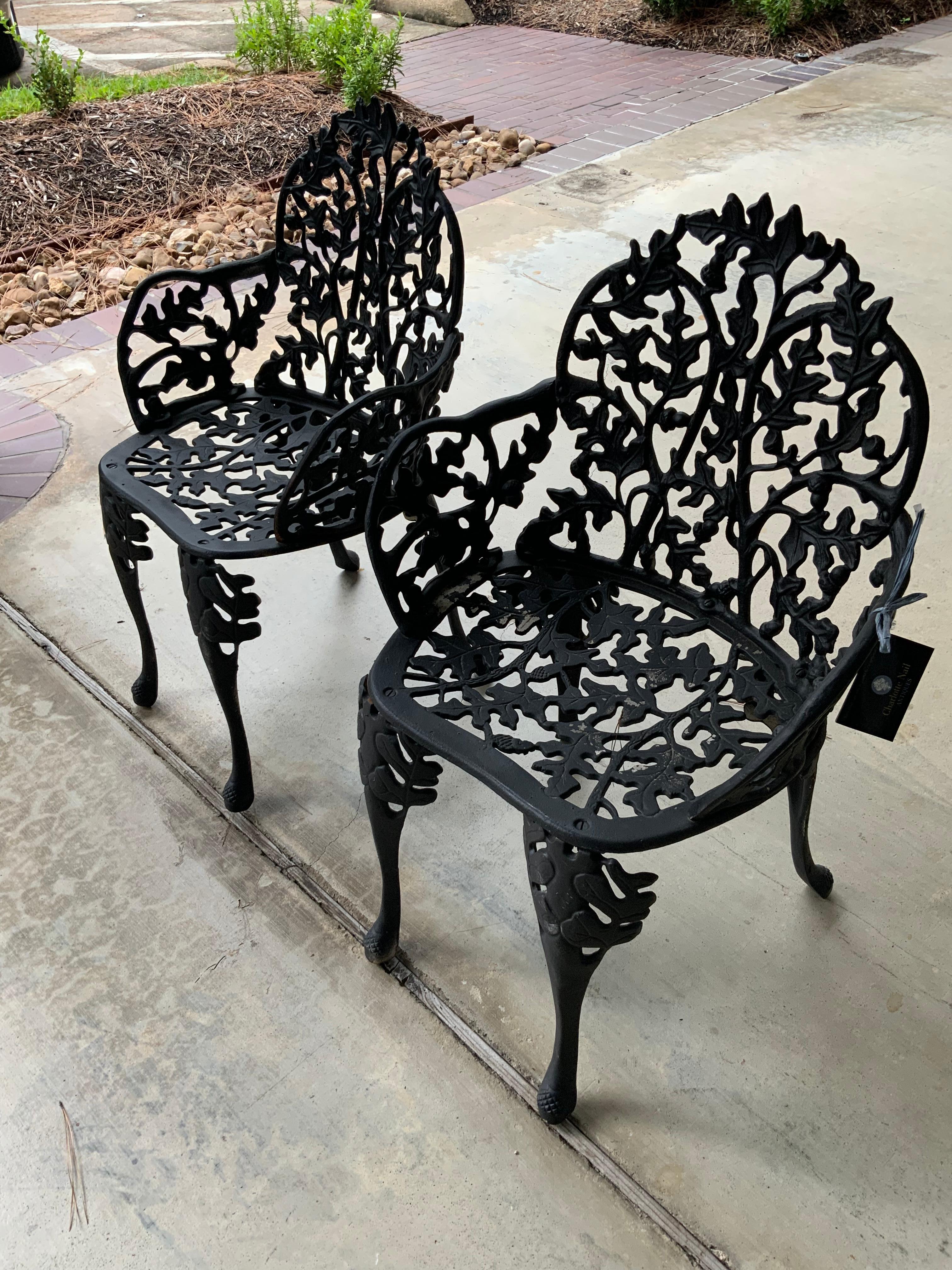 20th Century Pair Antique Black Iron Garden Chairs with Faux Bois Design Acorn and Foliate For Sale