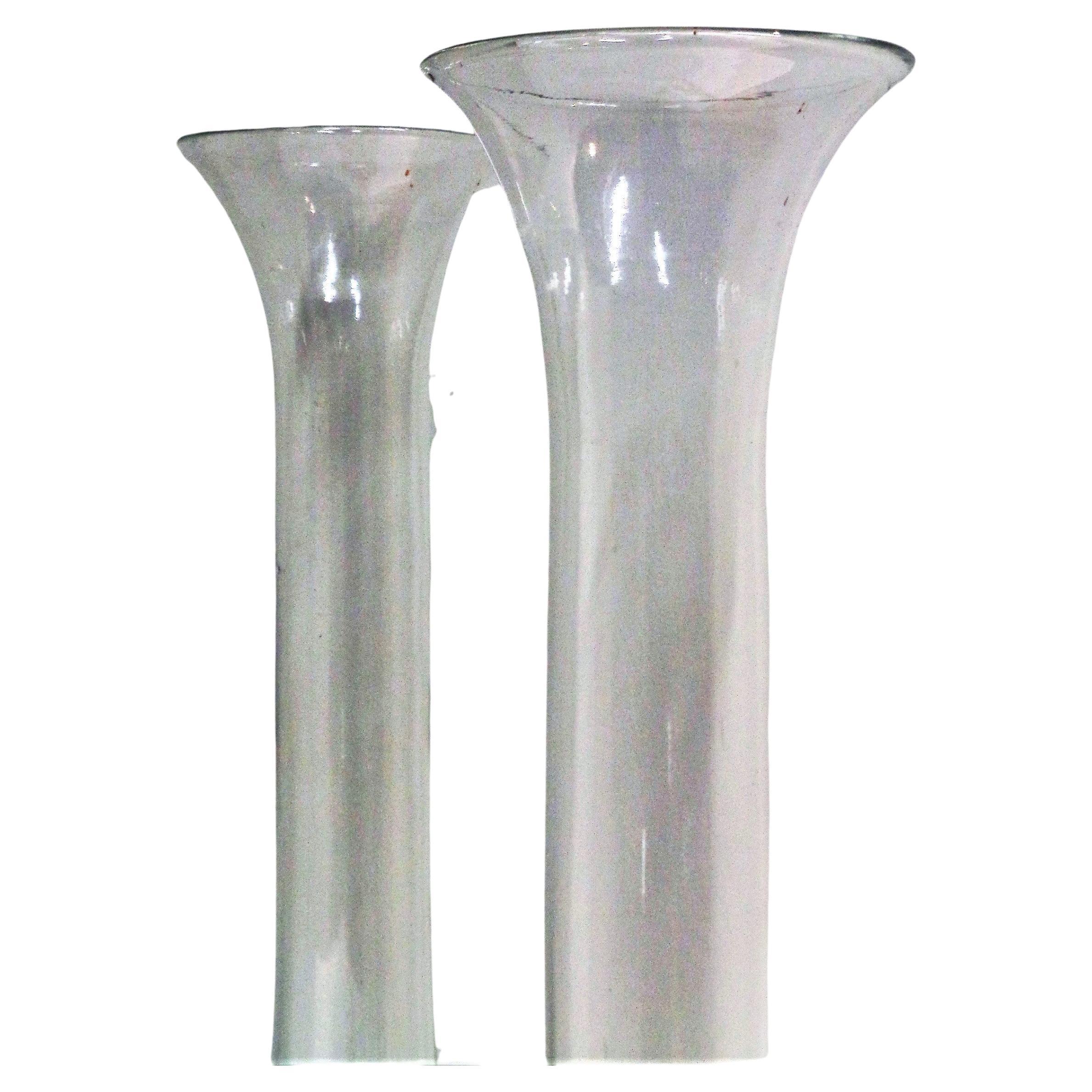 A pair of antique clear blown glass flower iris gladioli vases with rough pontil marks on underside bottom. Tall sculptural elegant form. Circa 1930-1940
 **** Price listed is for the pair ***** 
Look at all pictures and read condition report in