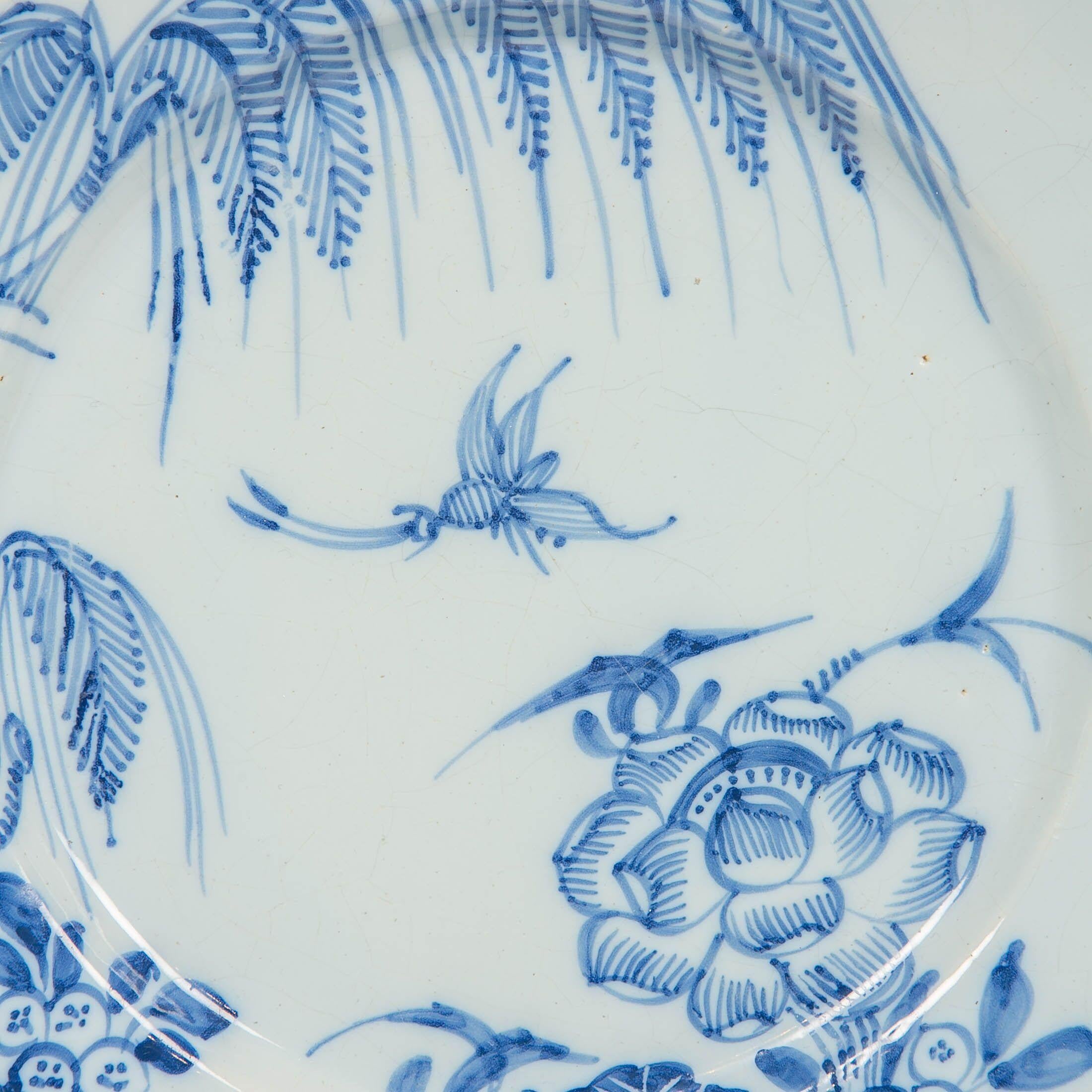Why we love it: On one of those crazy days looking at this brings serenity.
A pair of antique blue and white delft plates painted in a medium cobalt blue. These English delftware dishes were made in the mid-18th century, most probably in *Lambeth,