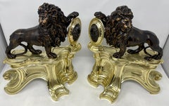 Paire de chenets héraldiques en bronze ancien et bronze doré, datant d'environ 1855-1865