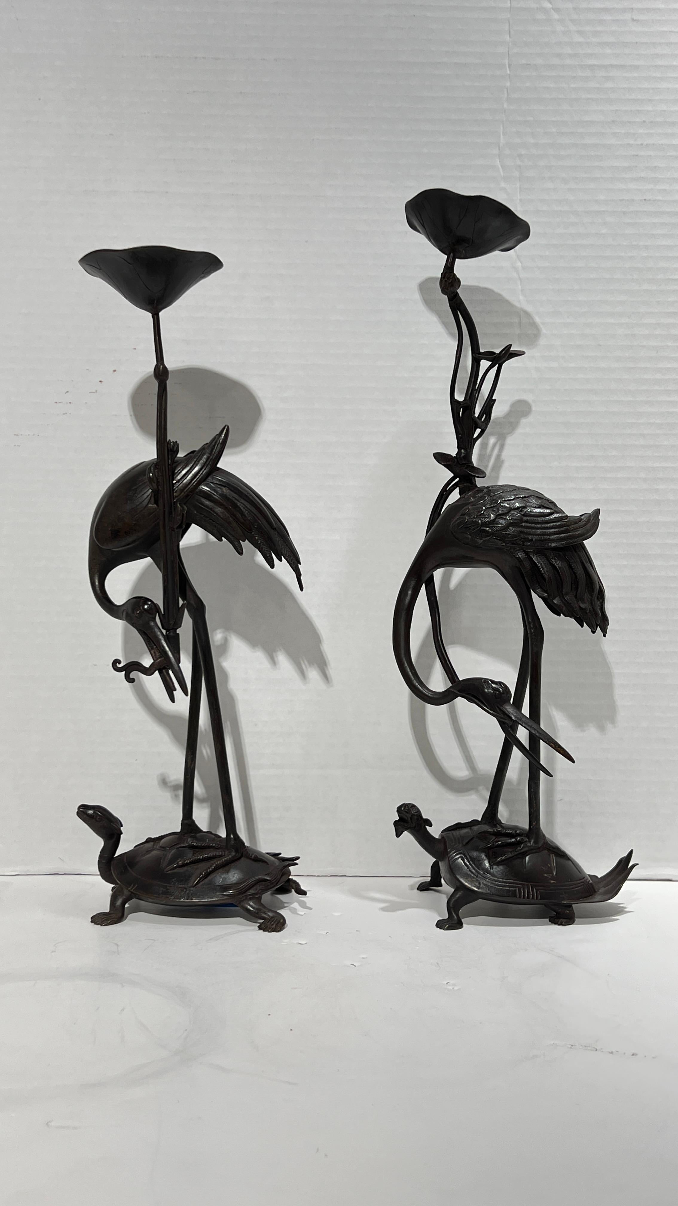 Meiji Pair Antique bronze  Patinated Japanese Crane Form Candlesticks For Sale