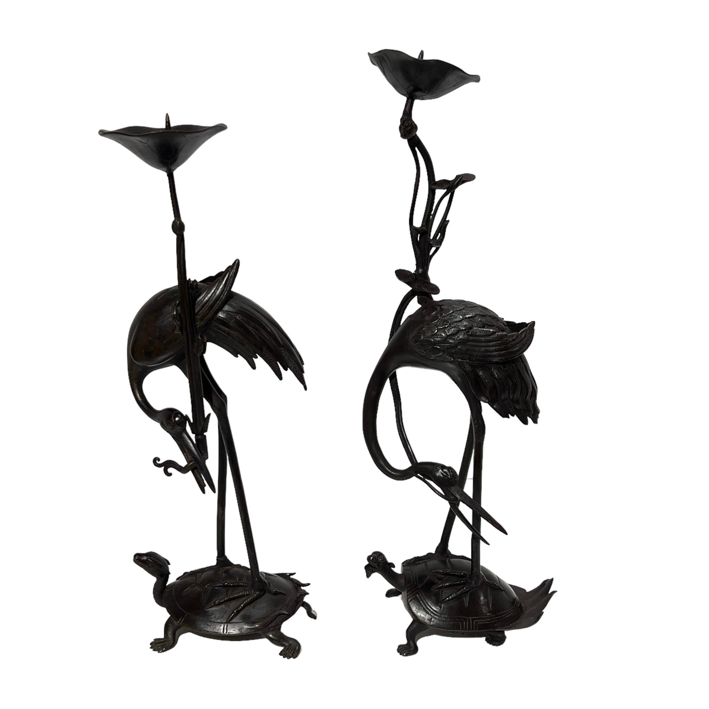 Bronze Pair Antique bronze  Patinated Japanese Crane Form Candlesticks For Sale