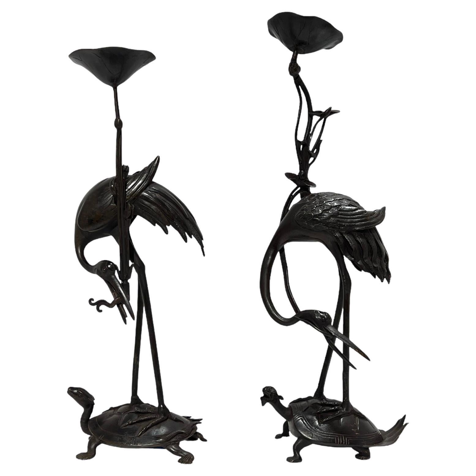 Pair Antique bronze  Patinated Japanese Crane Form Candlesticks For Sale