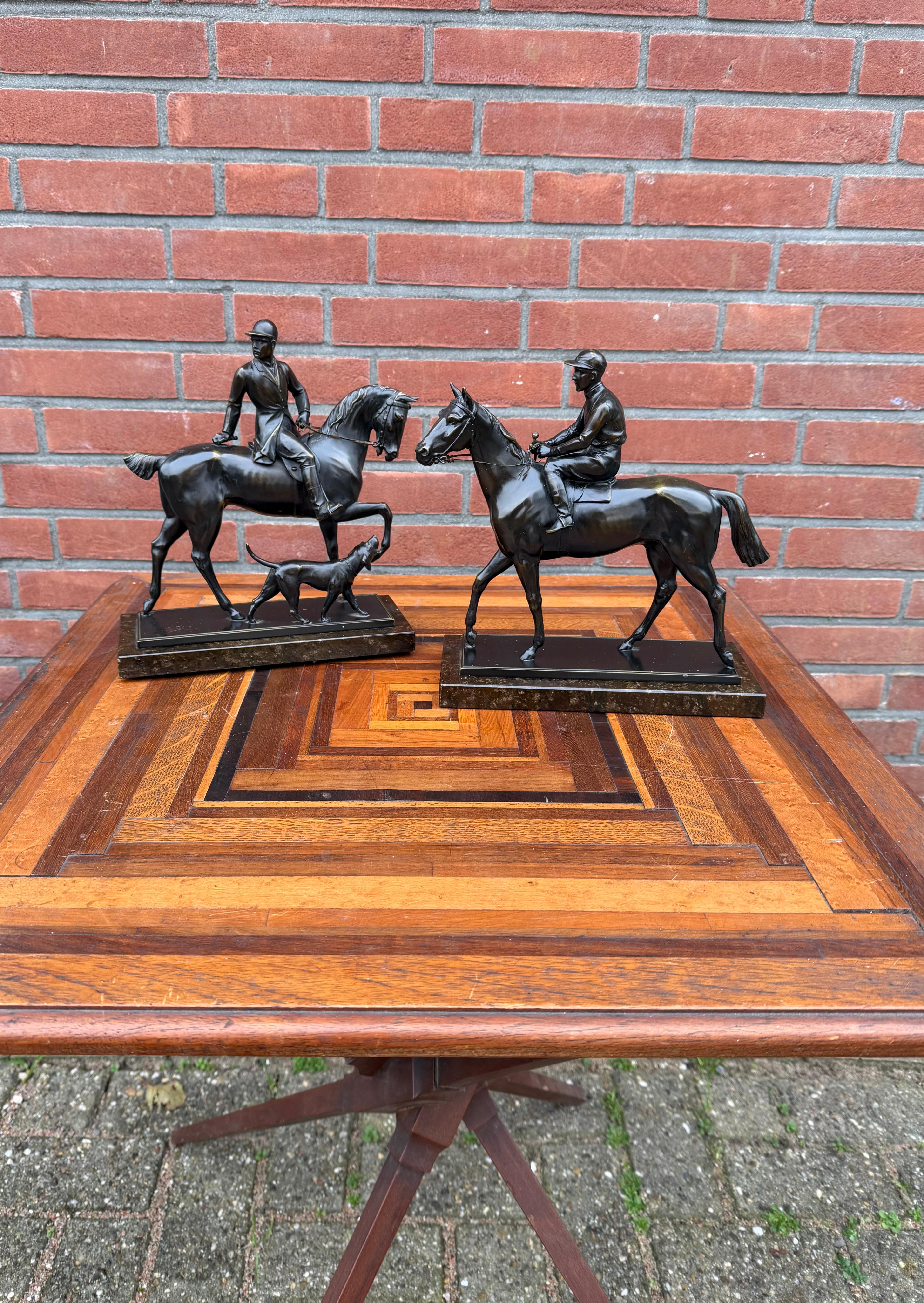 Magnificent pair of antique, top quality workmanship horse and jockey and hunt rider with hound sculptures.

Stylish, rare, and crafted with remarkable precision, this pair of bronzed equestrian sculptures is a genuine treat for collectors and