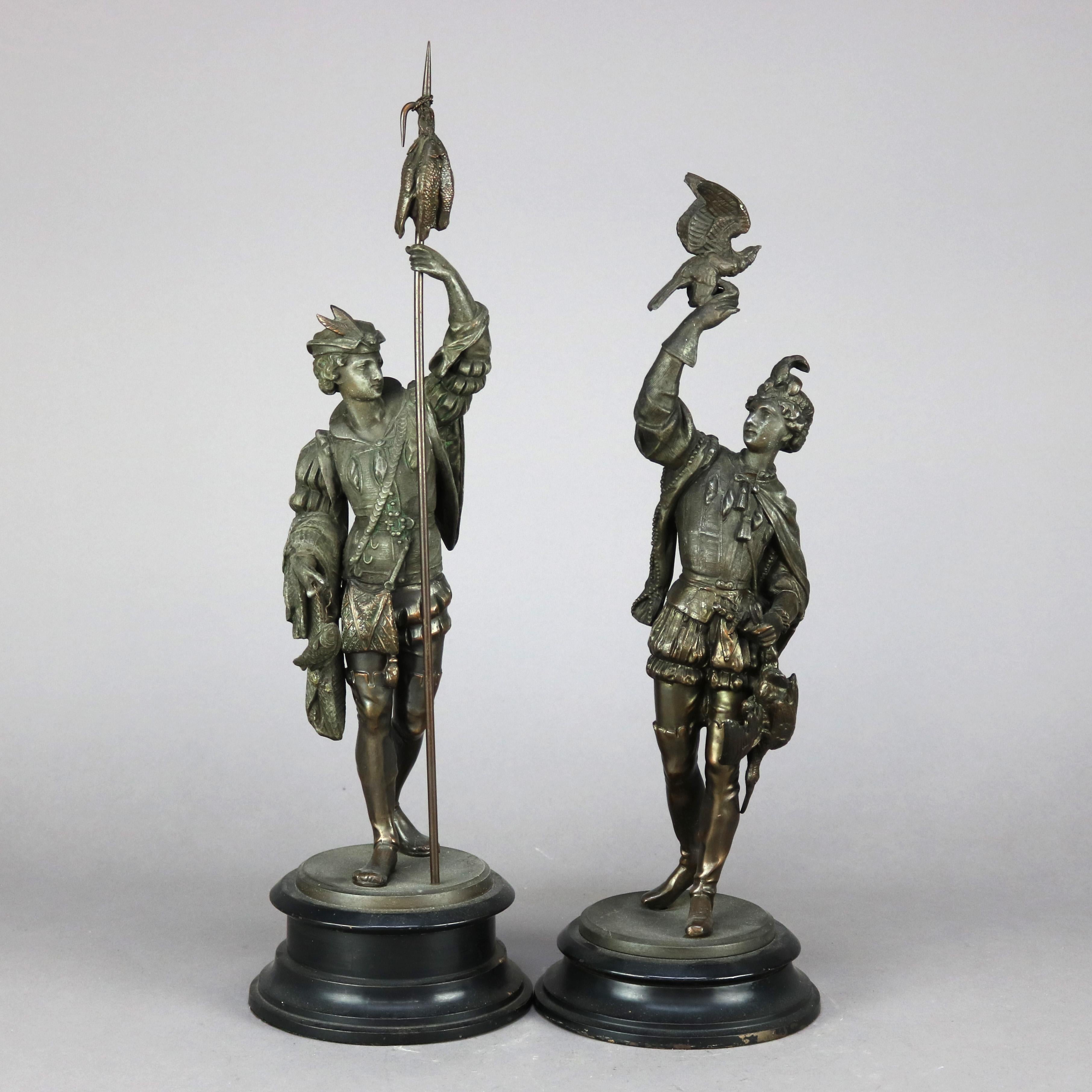 A pair of antique sculptures offer cast metal construction depicting Renaissance men, falconer, fisherman and fowl hunter with birds, seated on ebonized bases, c1890

Measure - 21.25'' H x 6'' W x 6'' D.