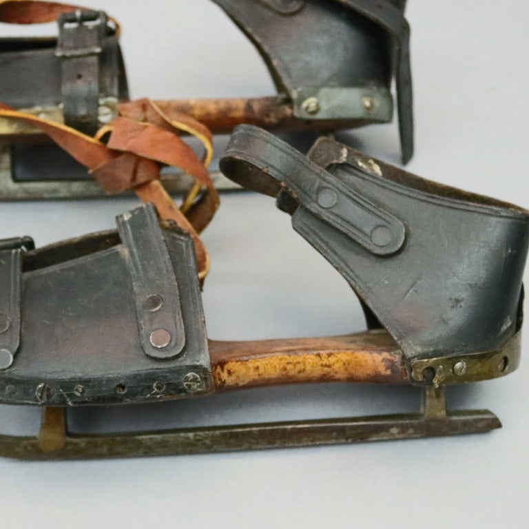 Pair of Antique Buckled Leather and Wood Ice Skates, 19th Century at