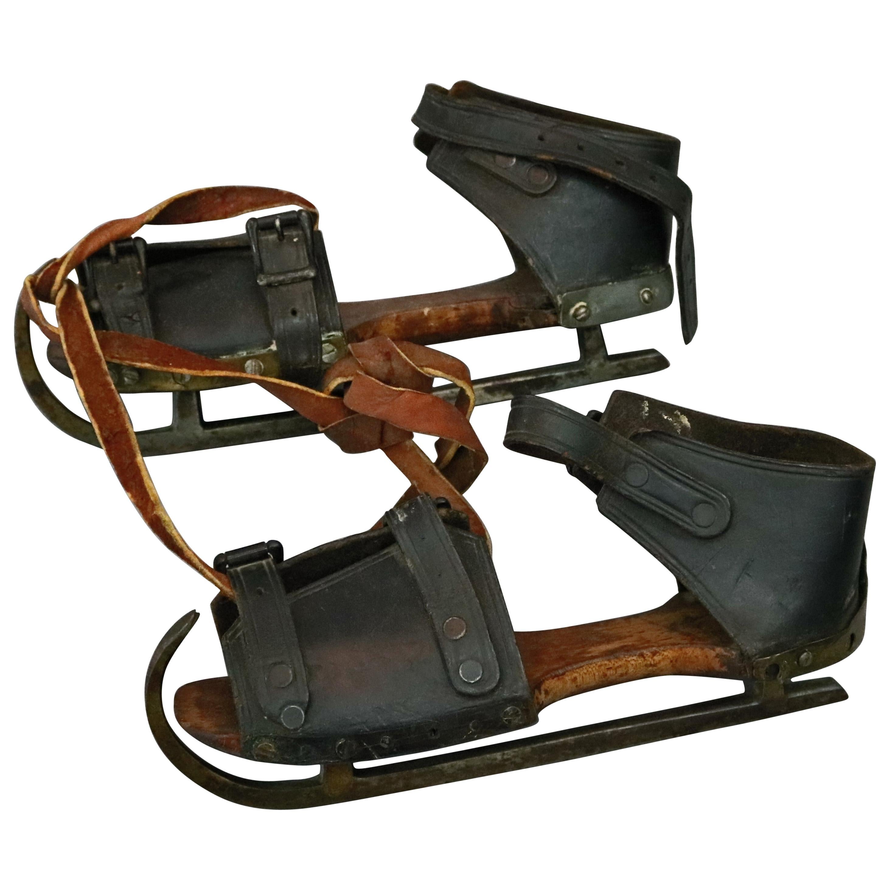 Pair of Antique Buckled Leather and Wood Ice Skates, 19th Century at 1stDibs