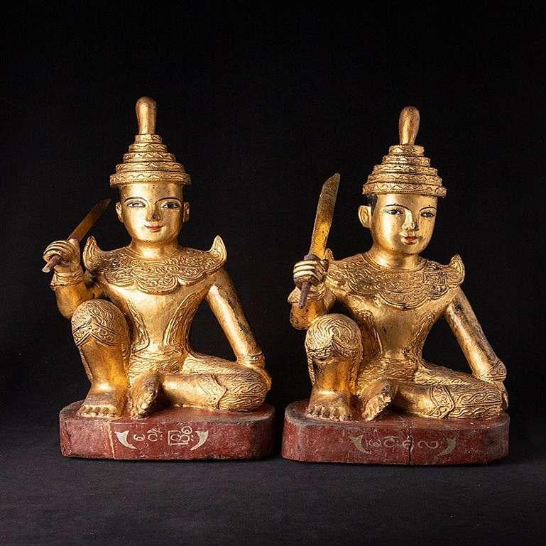 Material: wood
62 cm high 
28 cm wide and 23 cm deep
Weight: 14.25 kgs
Gilded with 24 krt. gold
Originating from Burma
19th Century
With inlayed eyes.
 