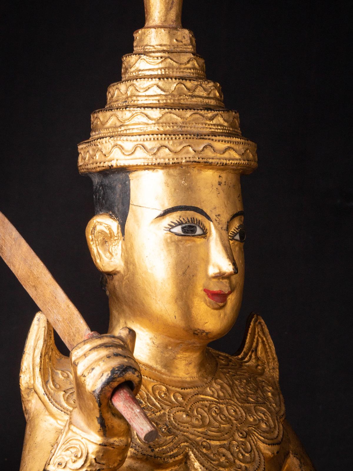 Material : wood
62 cm high
28 cm wide and 23 cm deep
Gilded with 24 krt. gold
19th century
With inlayed eyes
Weight: 14,25 kgs
Originating from Burma
Nr: 3029-4-9
 