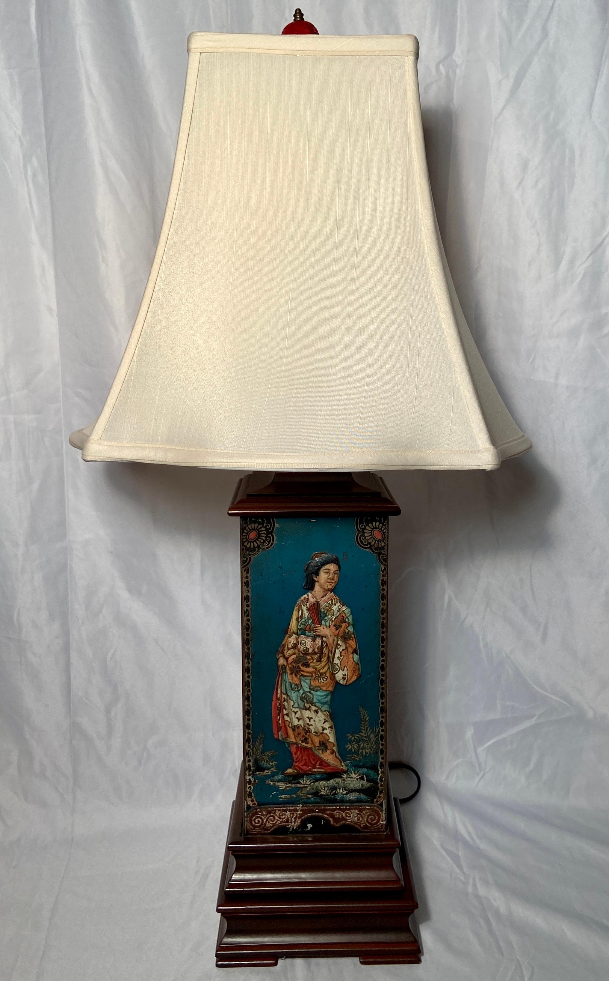 Pair antique carved wood and tole lamps with hand-painted Chinese scenes, circa 1890-1910.