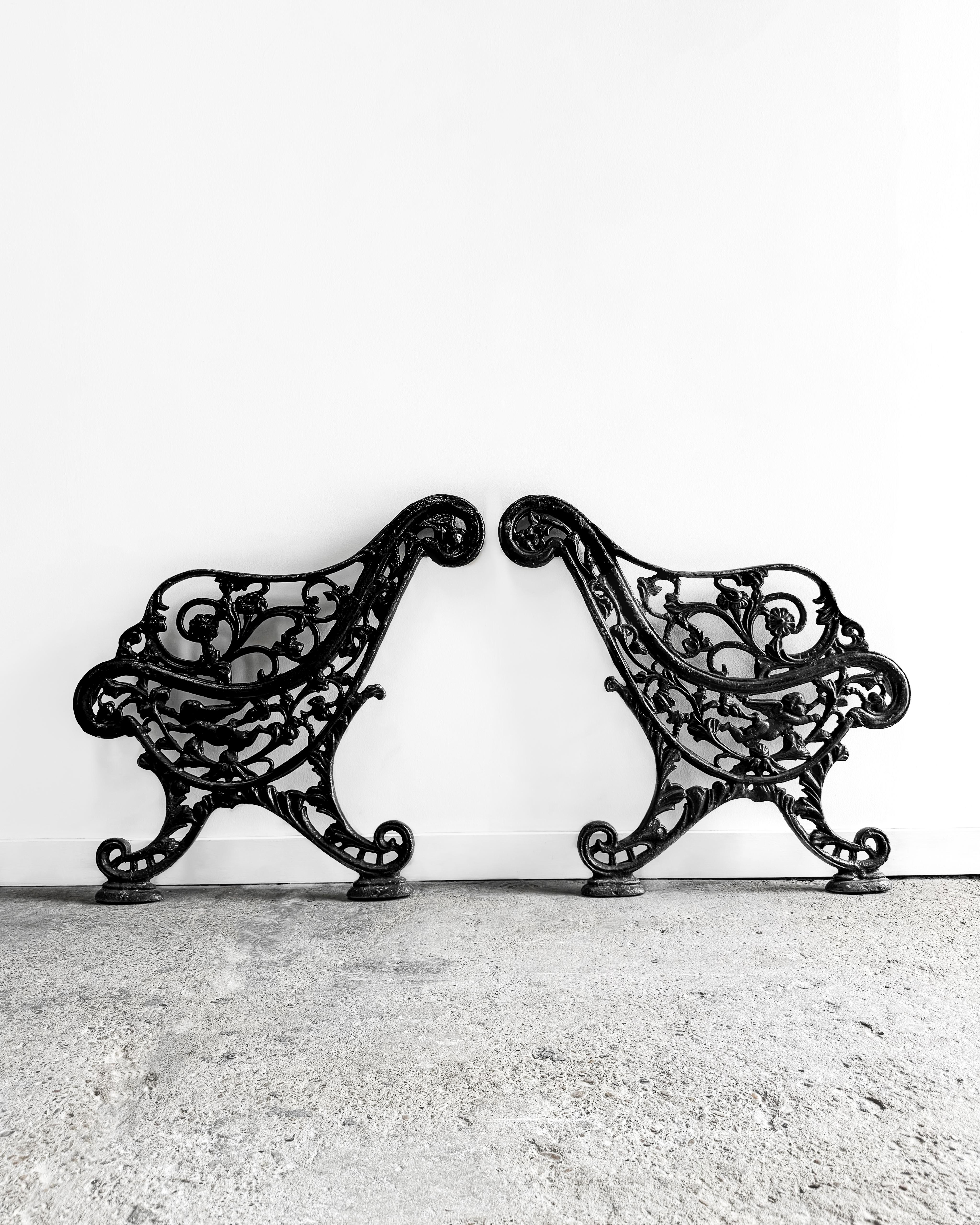 This pair of antique Victorian garden bench ends is a project piece brimming with potential. Crafted from cast iron and painted black, these bench ends feature ornate detailing that captures the spirit of the Victorian era. The intricate designs