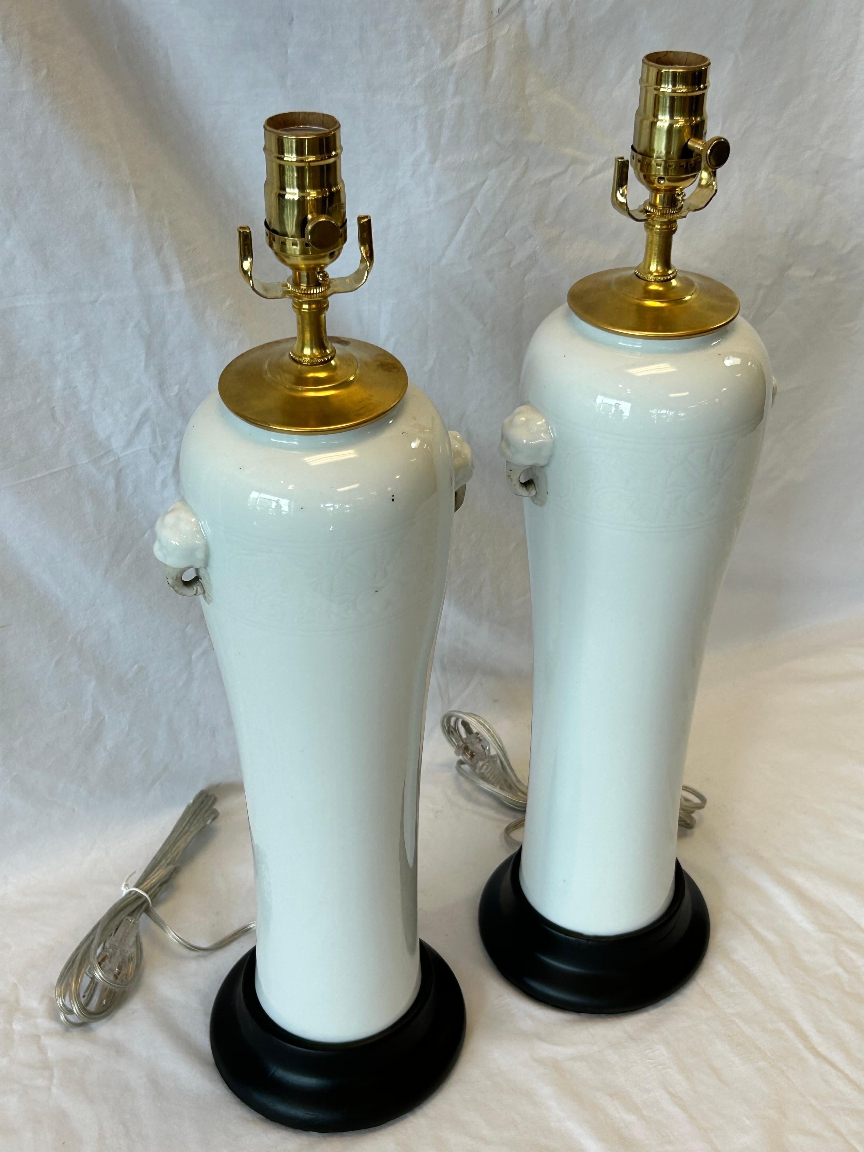 Chinese Export Pair Antique Chinese Dehua Table Lamps in White Blanc de Chine Style Black Bases For Sale