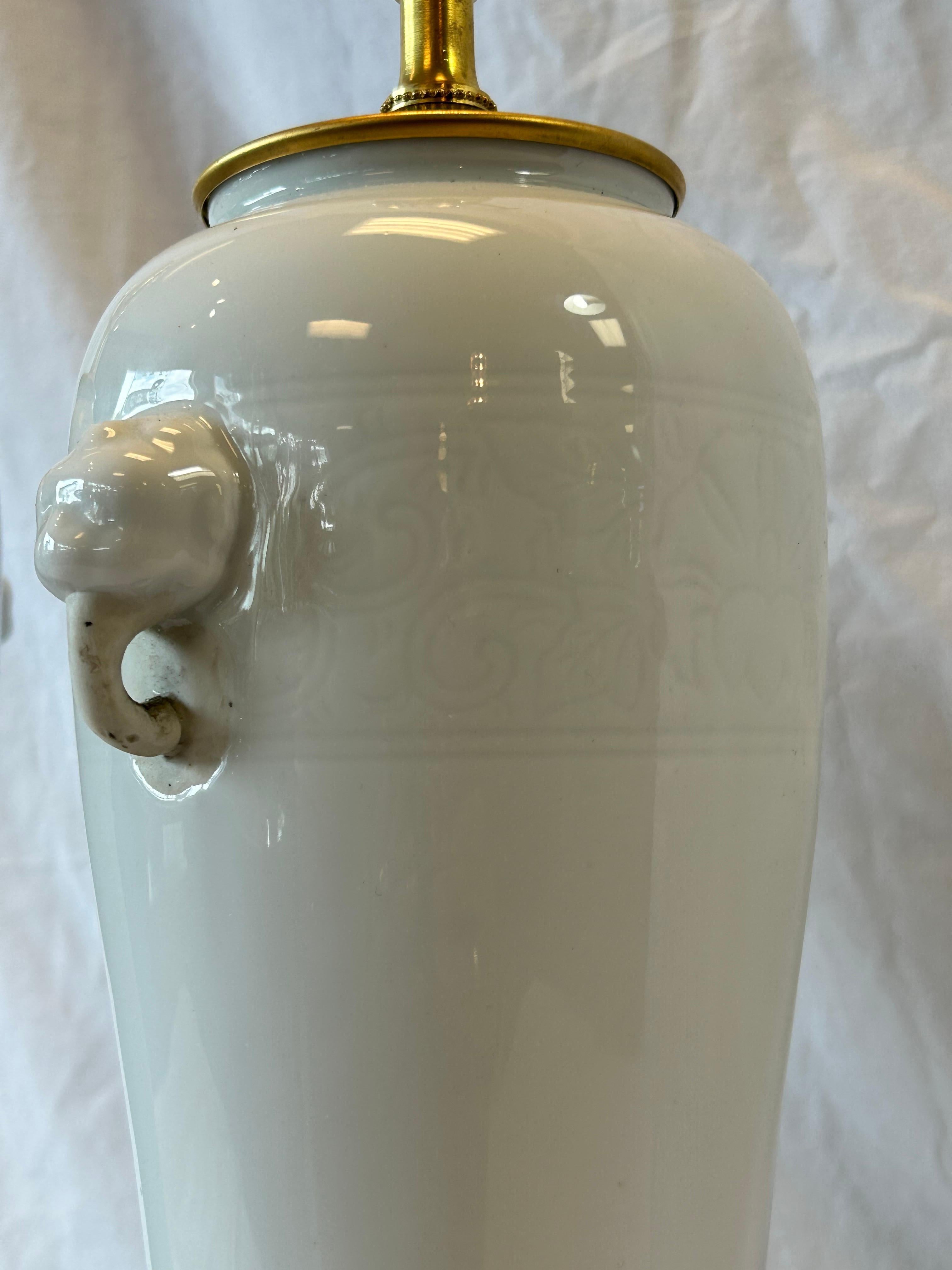 20th Century Pair Antique Chinese Dehua Table Lamps in White Blanc de Chine Style Black Bases For Sale