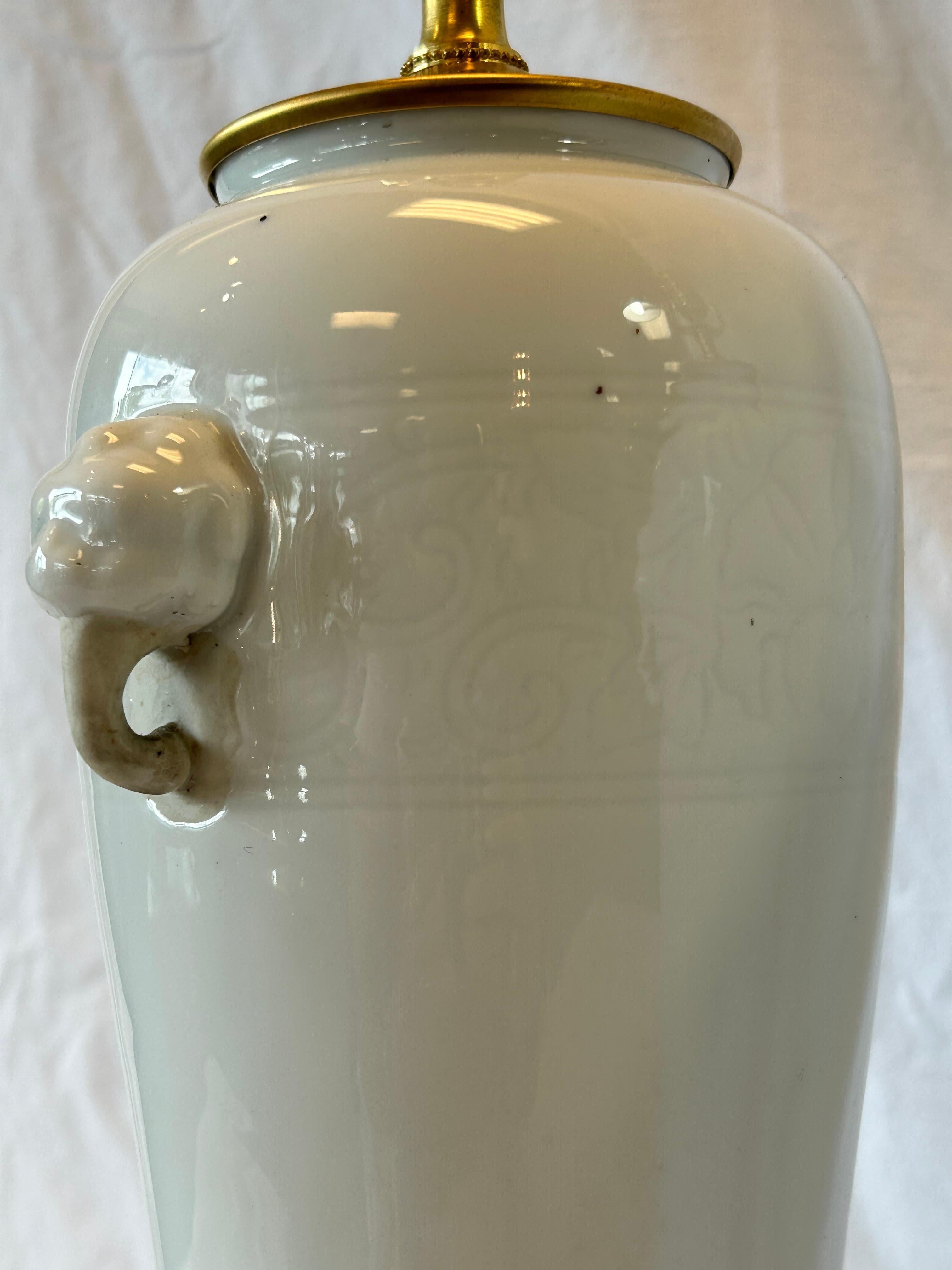 Ceramic Pair Antique Chinese Dehua Table Lamps in White Blanc de Chine Style Black Bases For Sale