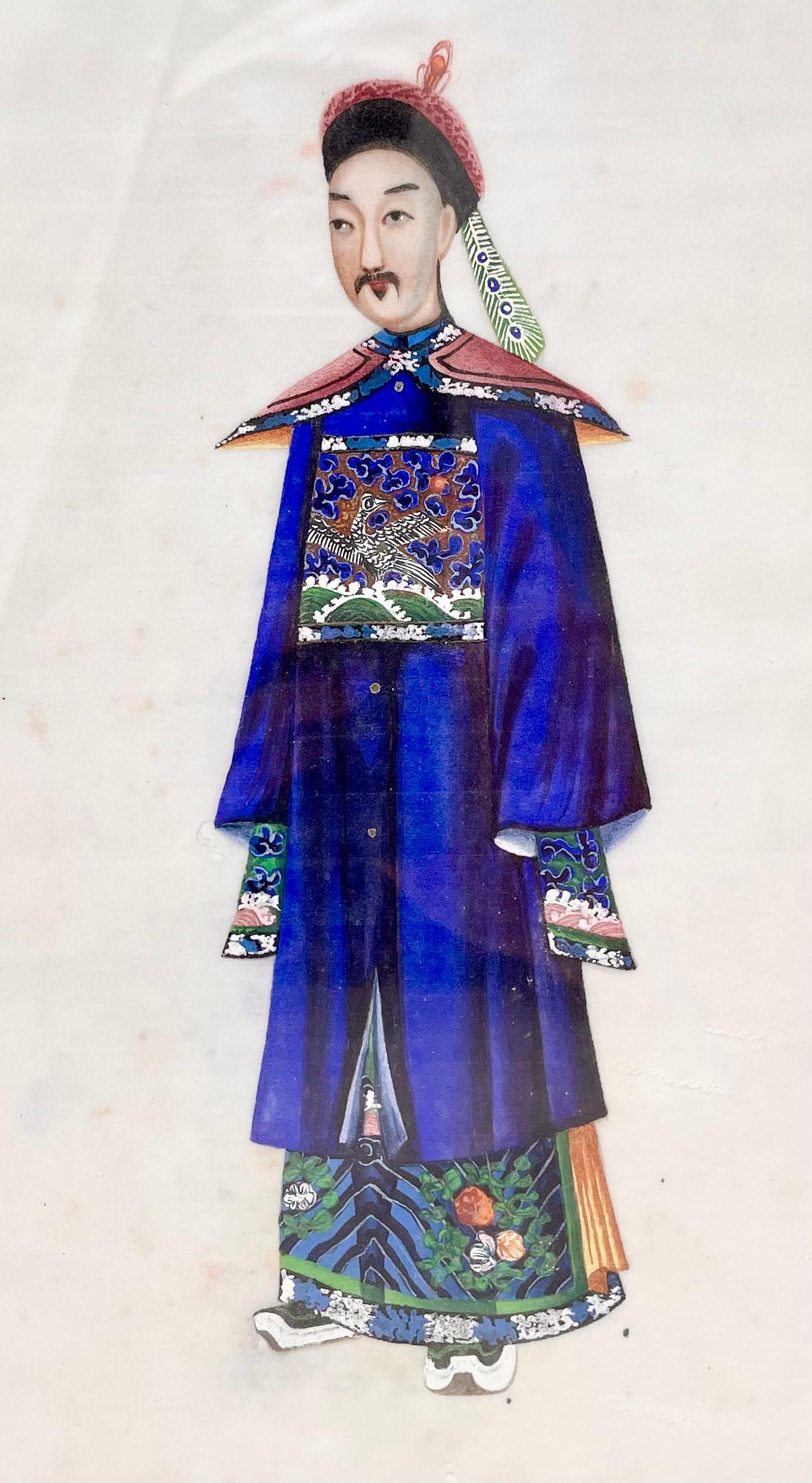 Pair antique 19th century Chinese framed oil paintings on silk of Canton figures in traditional costumes, circa 1880.