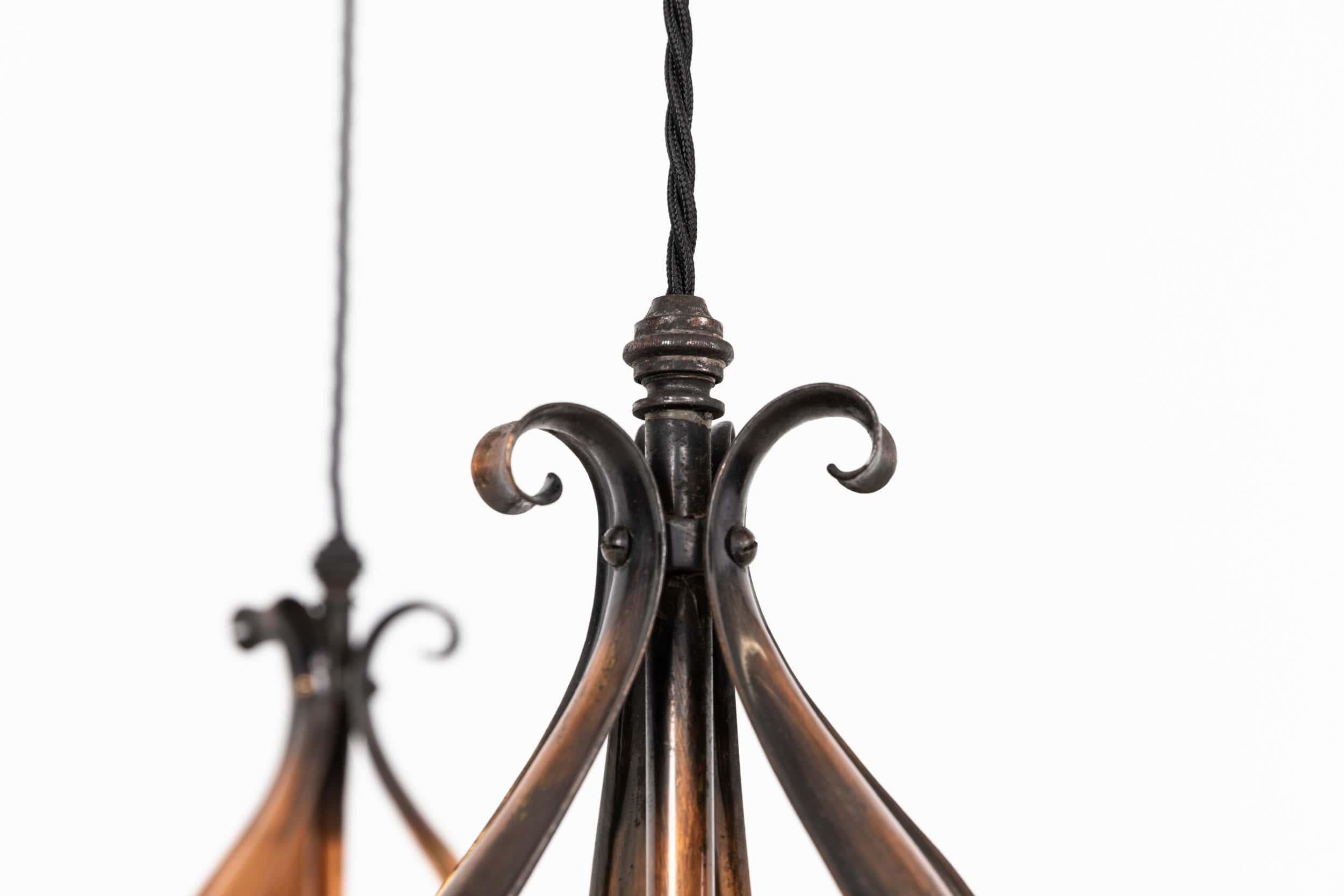 Inizio XX secolo Coppia di lampade a sospensione in vetro a spillo Holophane, in rame, del 1910 ca. in vendita