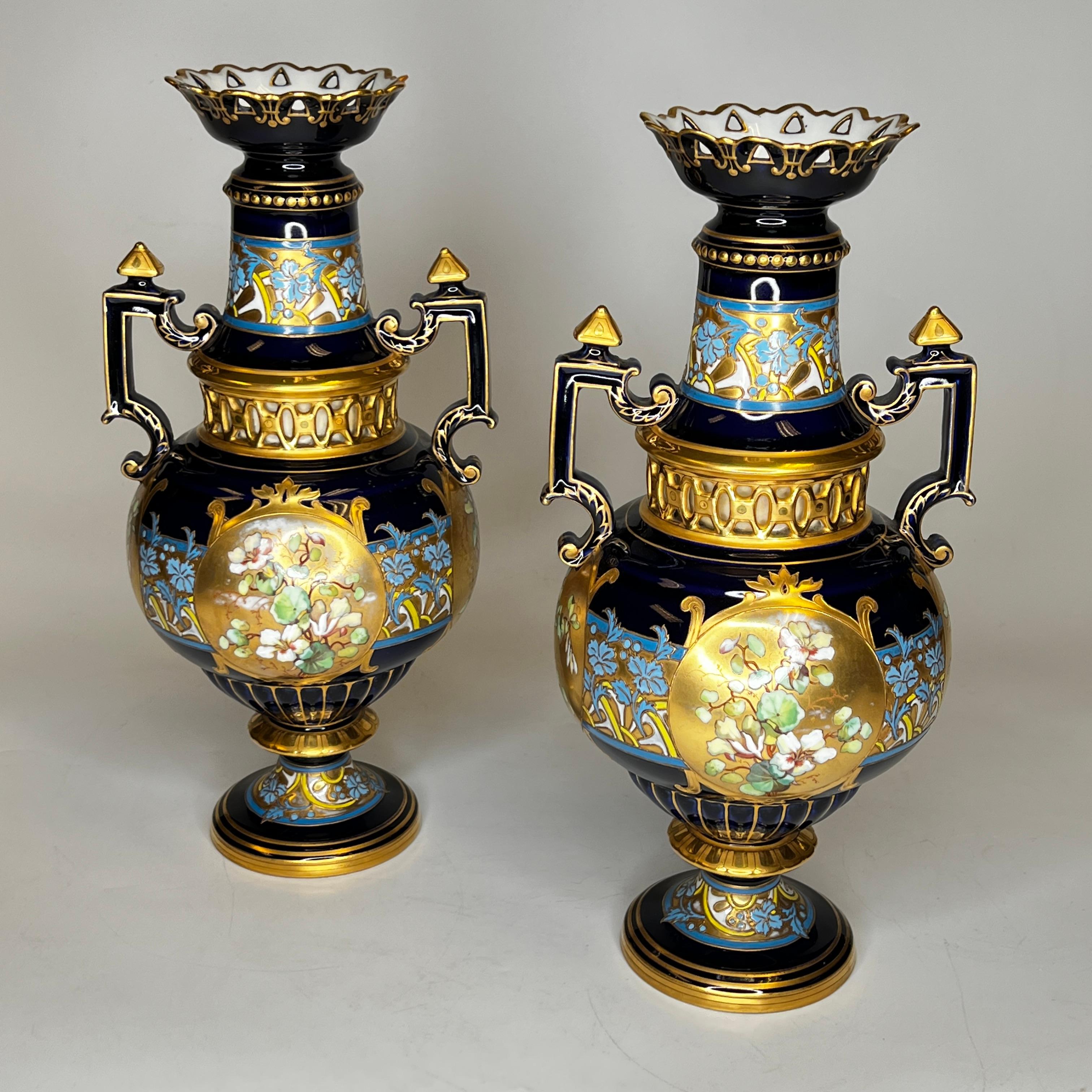 Pair Antique Czech Floral Painted and Gilded Porcelain Vases by Fischer and Meig, circa 1880s.