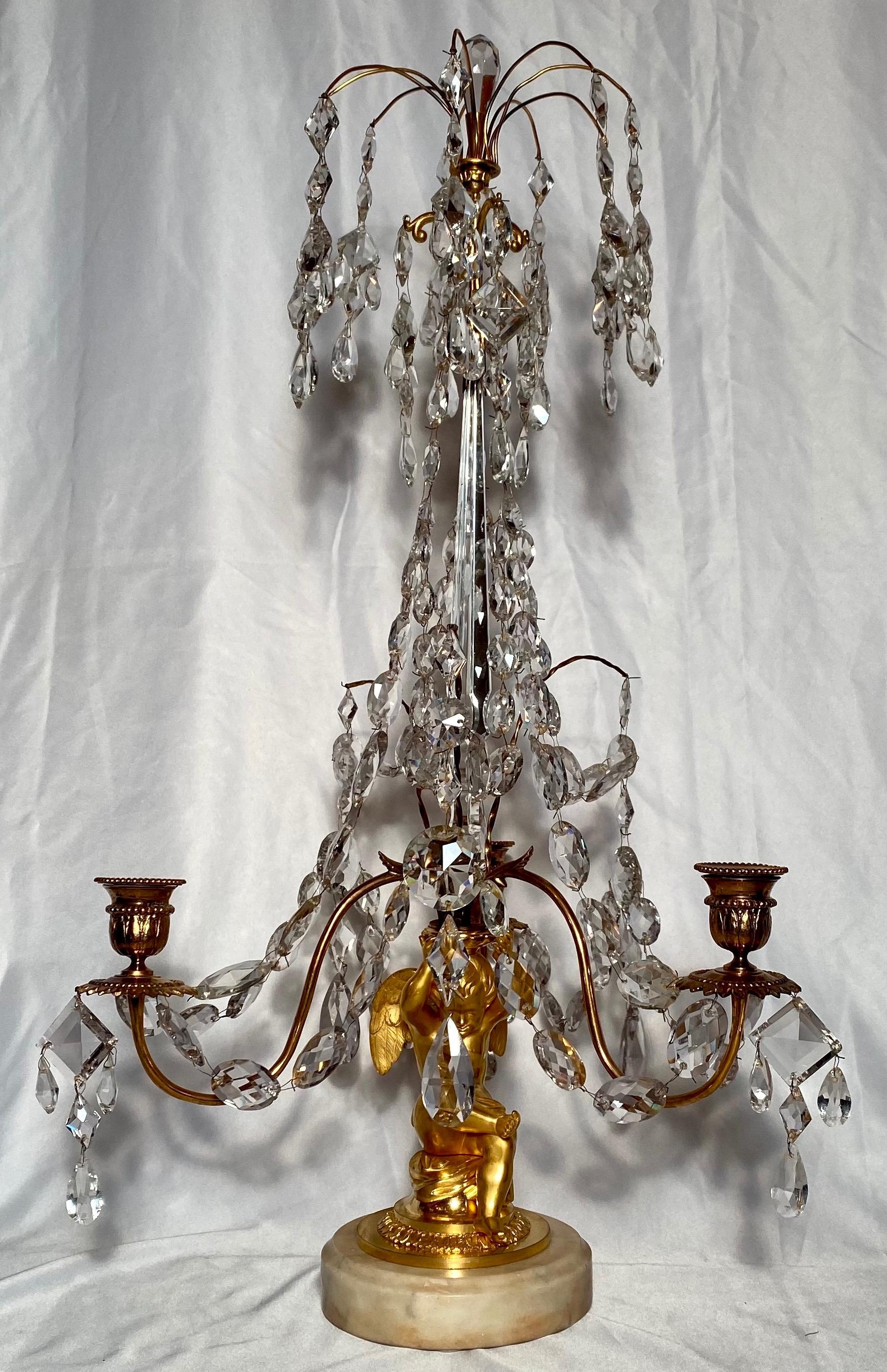 Pair of antique delicate ormolu and crystal candelabra, circa 1890.
  
  