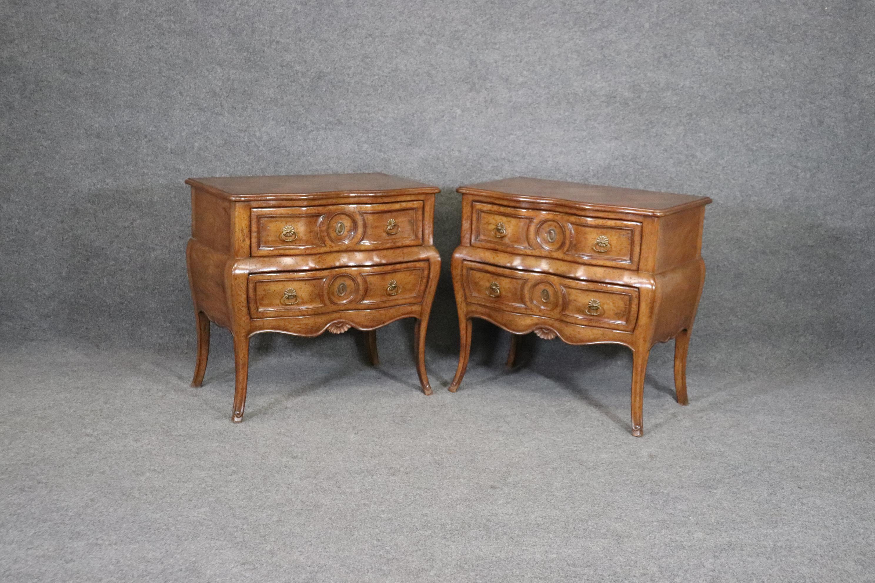 This is a gorgeous pair of signed Auffray of New York French provincial commodes or nightstands. They are both done in an intentionally distressed antique appearance and look antique but date to teh 1950-60s era and are hand-made in New York City by