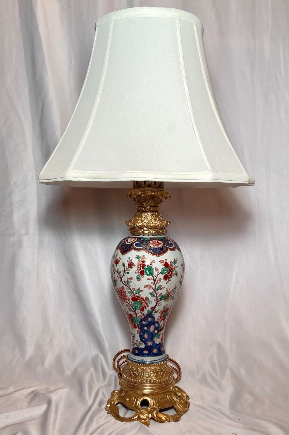 Pair of antique early 19th century ormolu mounted Imari Porcelain urn lamps.
