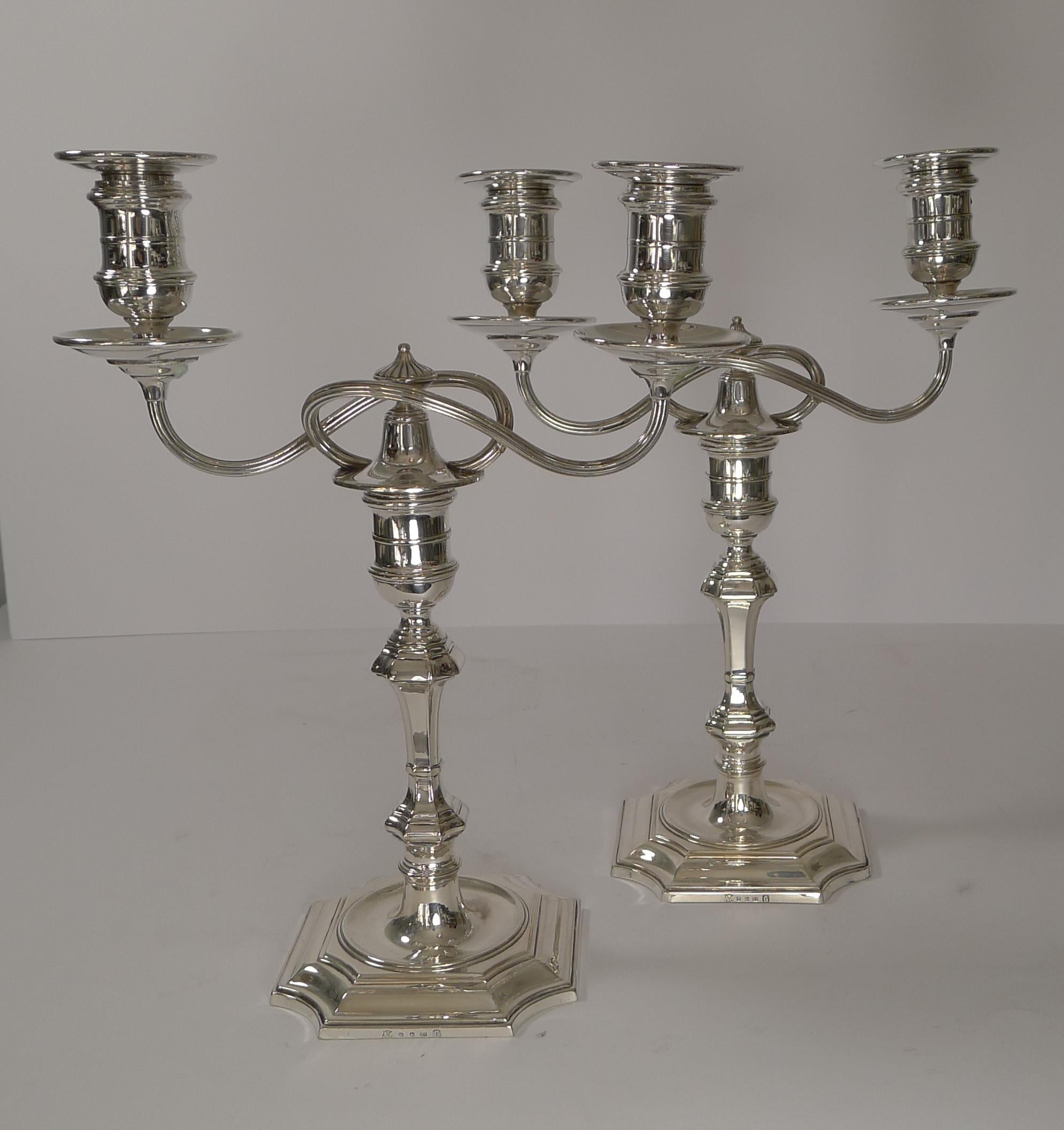 A fabulous small pair of Victorian two-light candelabra made by the top notch silversmith, Elkington and Co.

The two arms can be removed if desired, two drip trays removed and placed in the bases to create a lovely small pair of