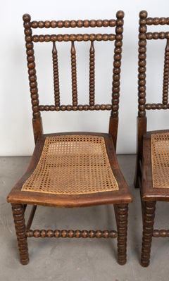 Pair Antique English 19th Century Arts And Crafts Bobbin Cane Low Side Chairs