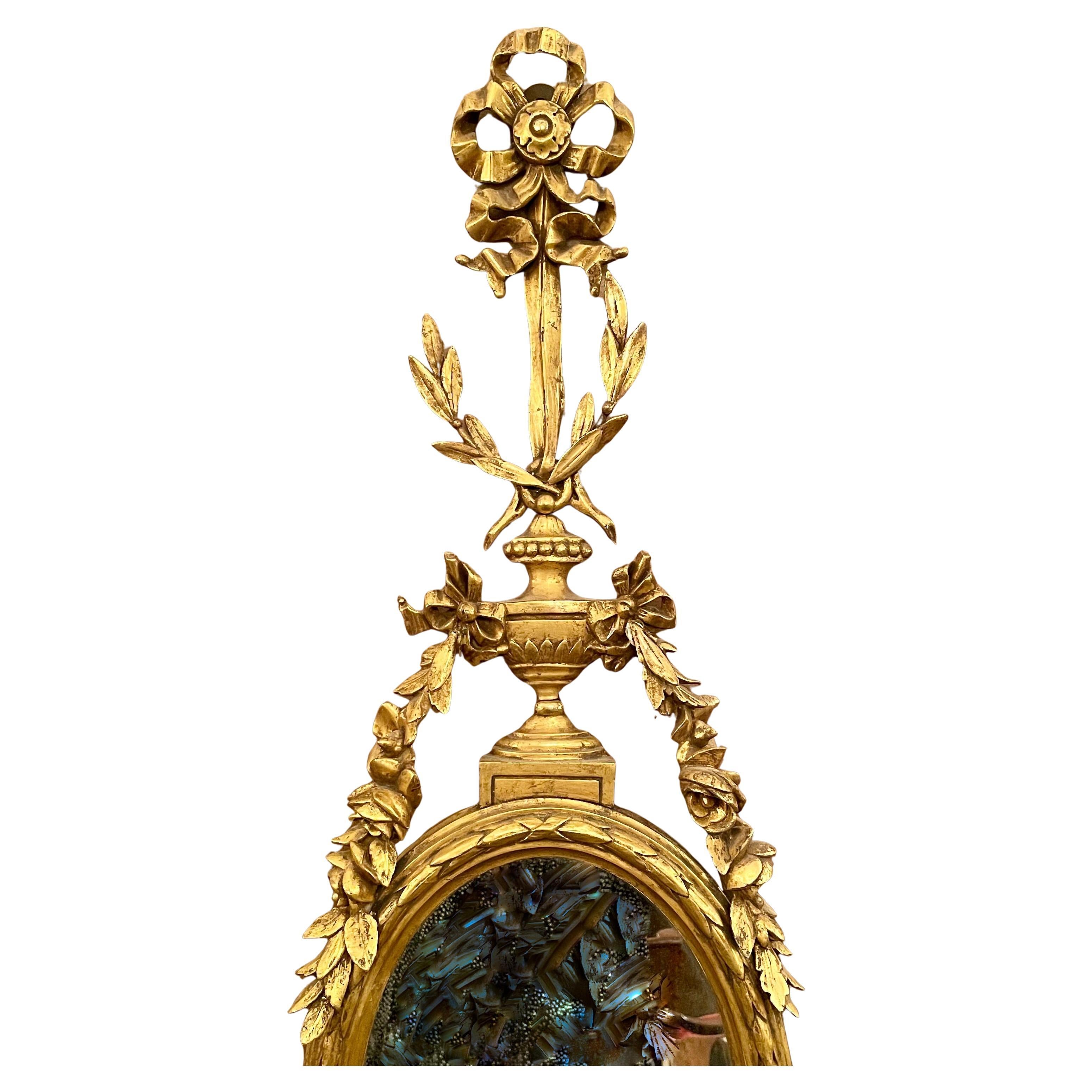 Paire de miroirs anciens en bois sculpté et doré de style Adams, vers 1880. en vente 1