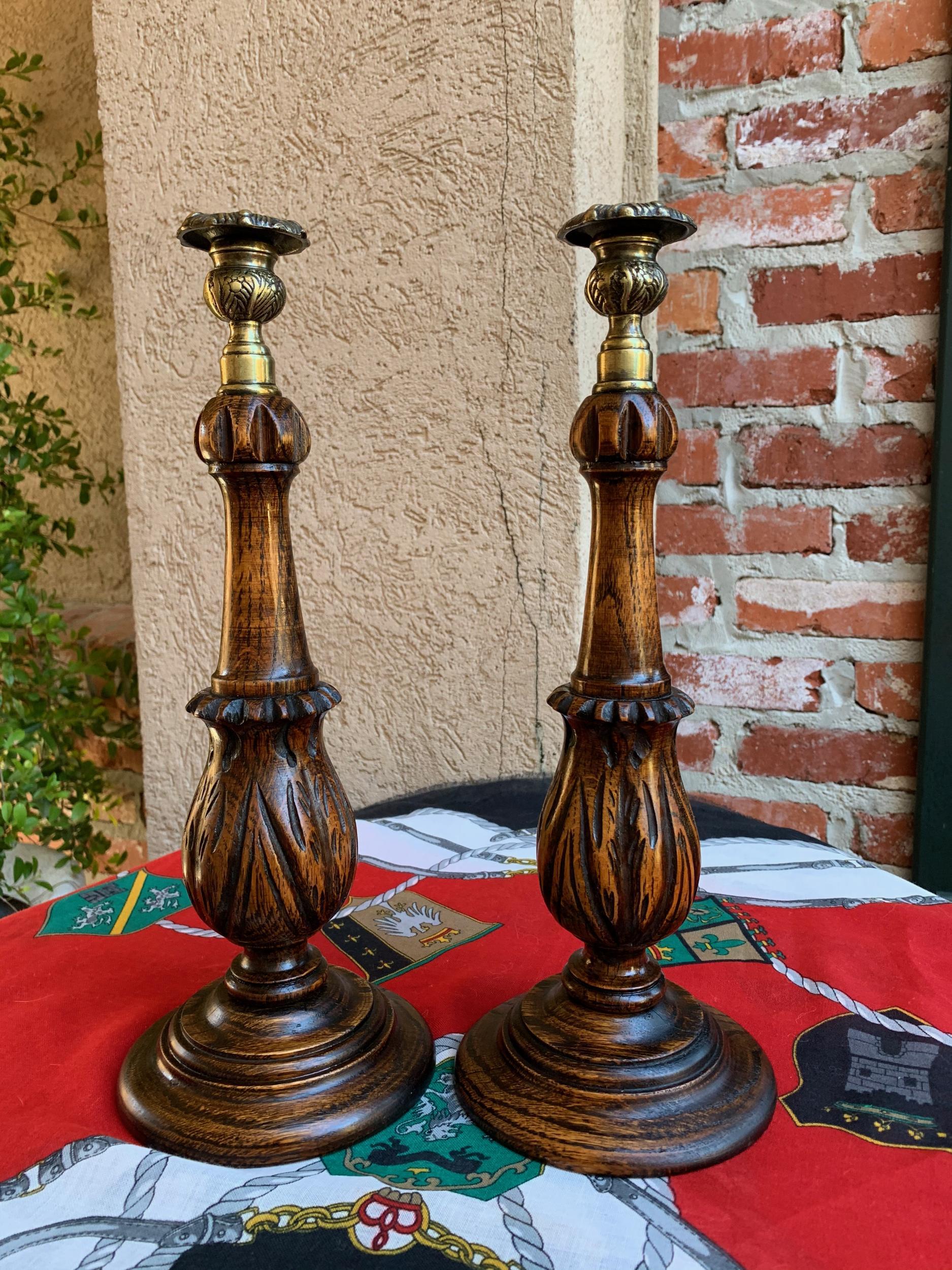 Pair of antique English carved tiger oak candlesticks candleholder brass thistle

~Direct from England~
Another lovely pair of antique English oak candlesticks!
~Very unique, shaped and carved, fluted columns with bulb shaped lower~
~Beautiful