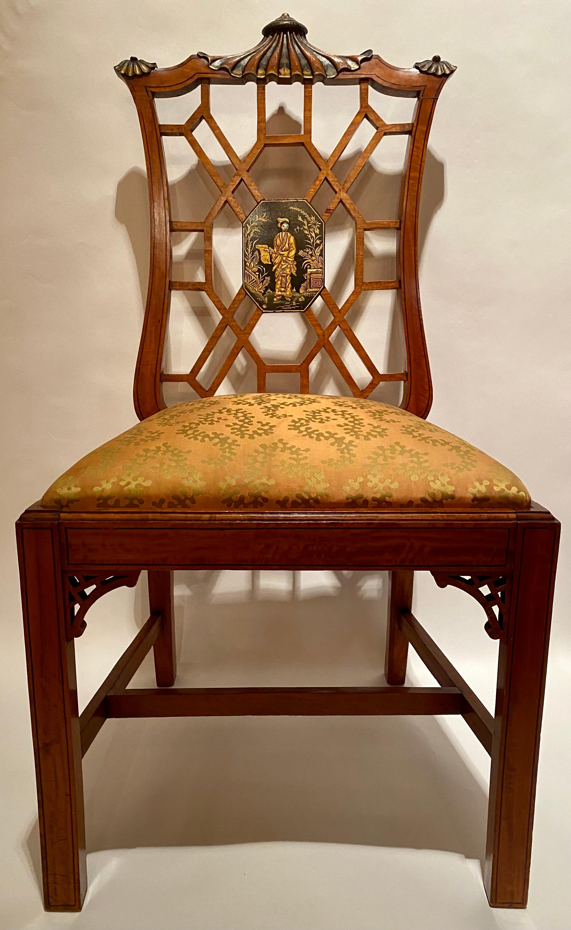 Pair antique English edwardian satinwood side chairs with chinoiserie lacquer details, Circa 1900-1910.