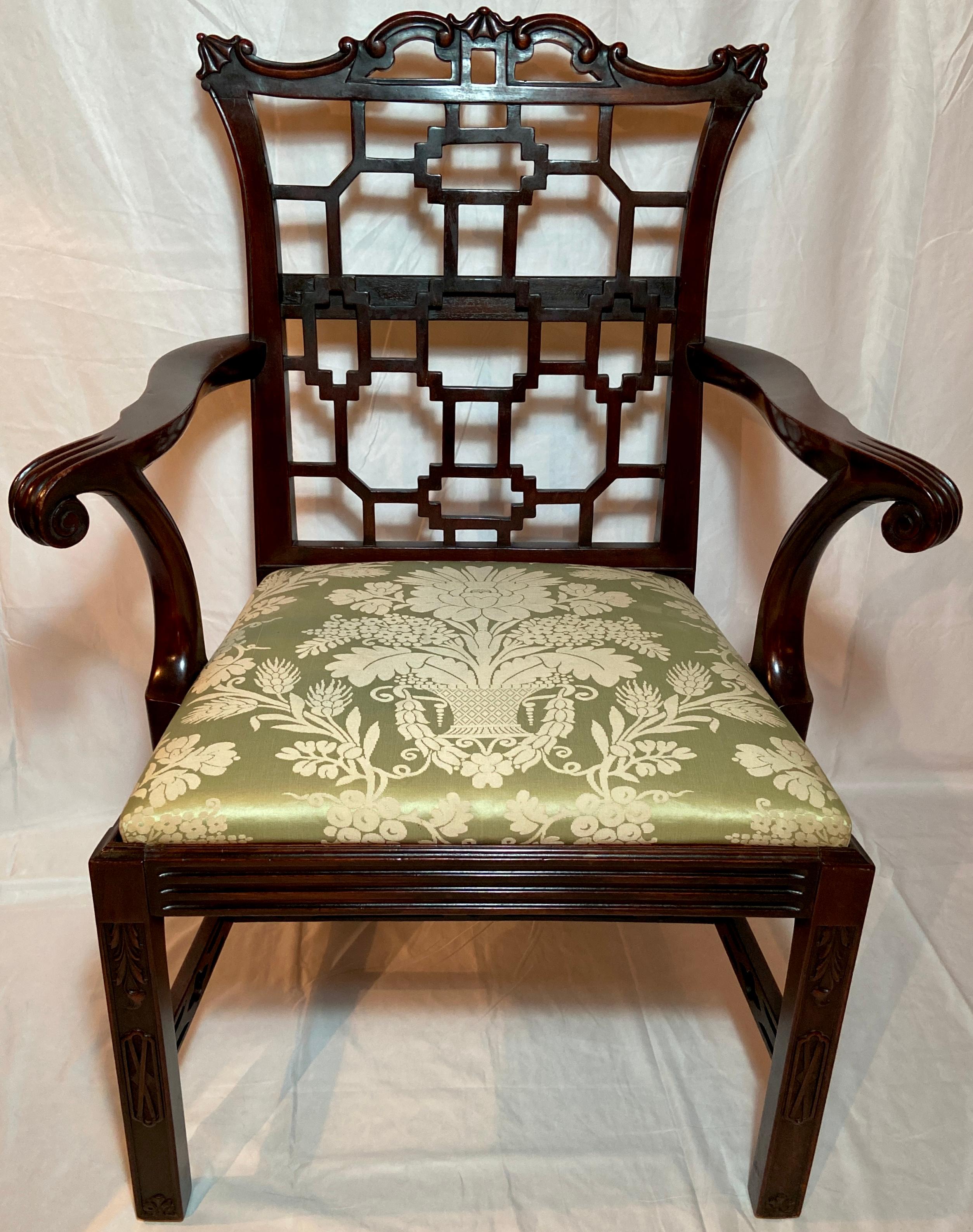 Pair antique English chippendale mahogany armchairs with lovely chartreuse silk upholstery, circa 1865-1875.