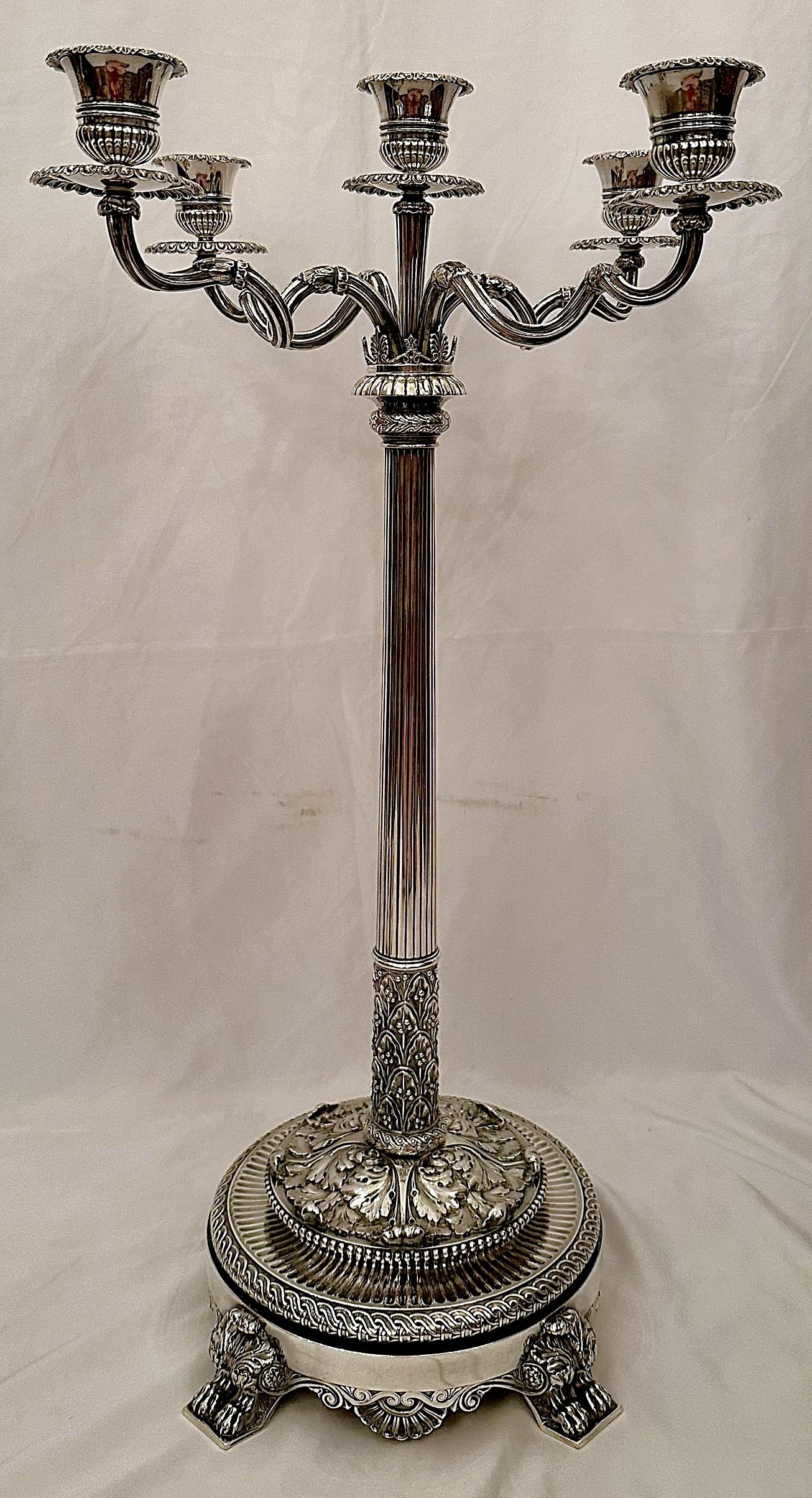 Coppia di antichi candelabri inglesi in argento massiccio 