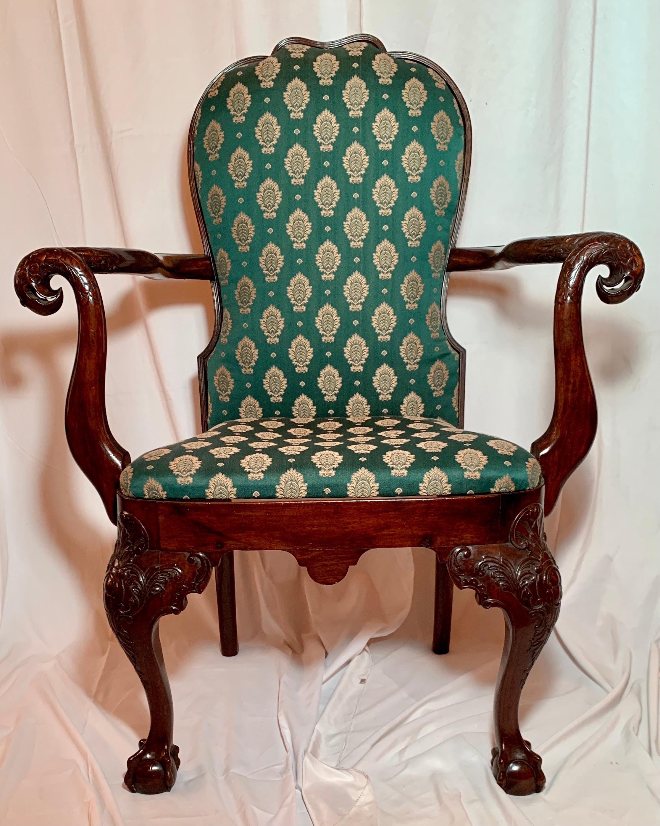 Pair antique English Mahogany arm chairs, Circa 1850-1870. Reupholstered with emerald green and gold fabric.