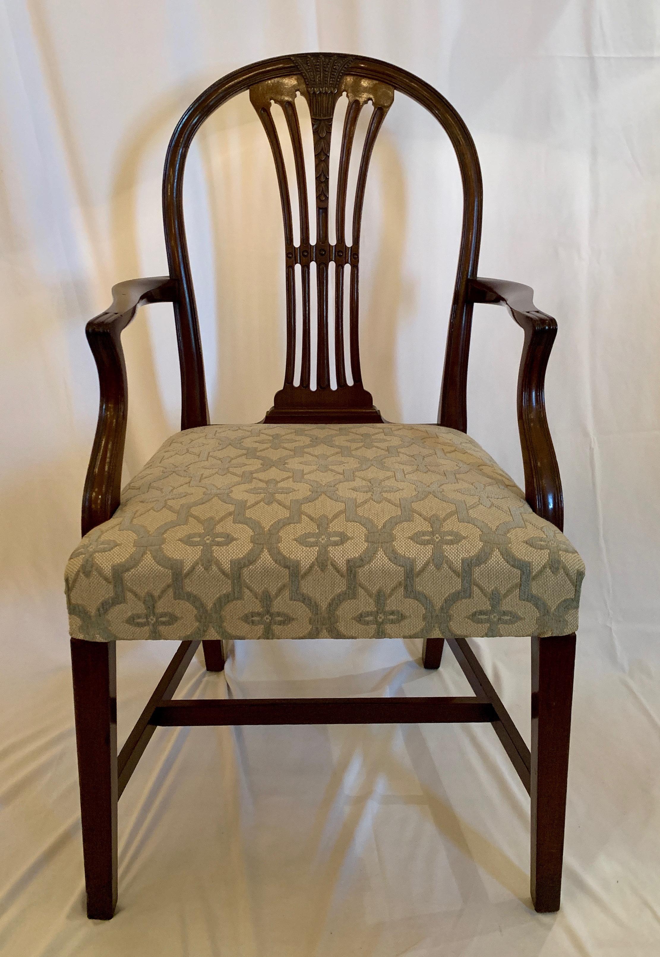  A lovely pair of armchairs with strong lines that would complement nearly any style of decor.